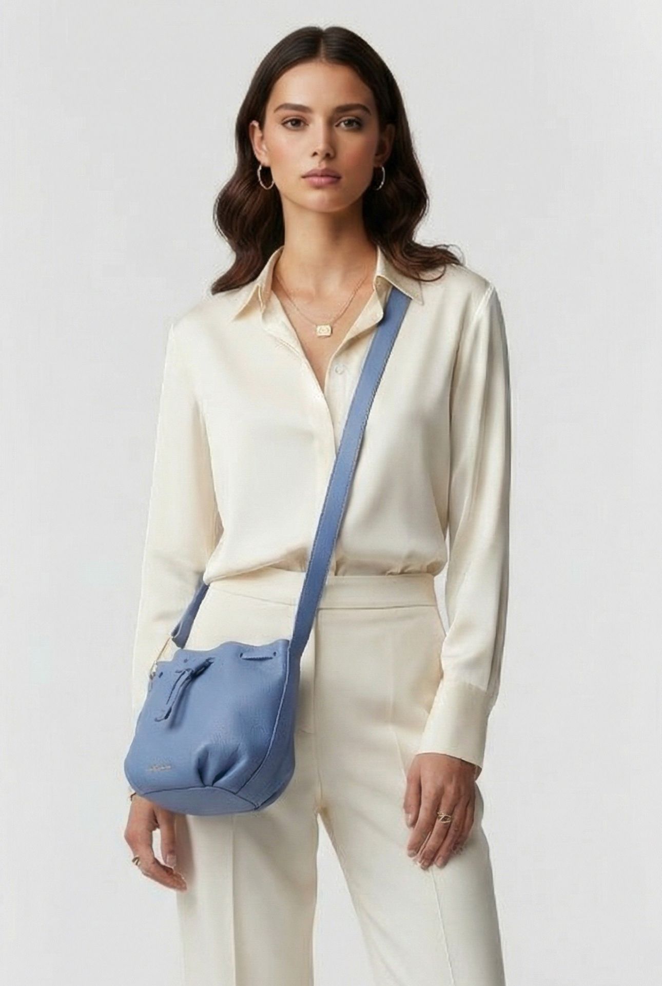 GRAINED LEATHER CROSS BODY BAG IN LIGHT BLUE 1