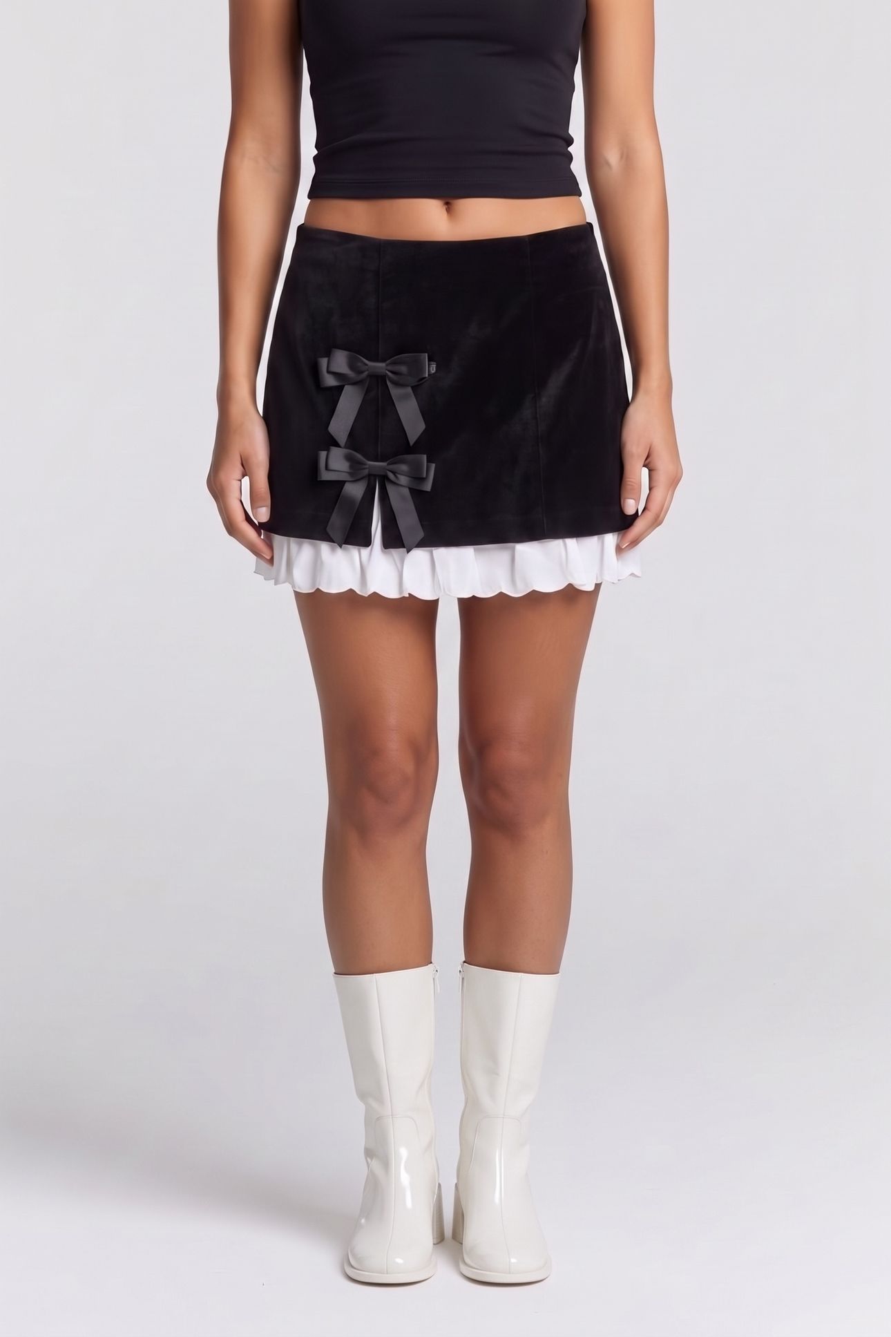 SHORT VELVET SKIRT WITH BOWS BLACK 1