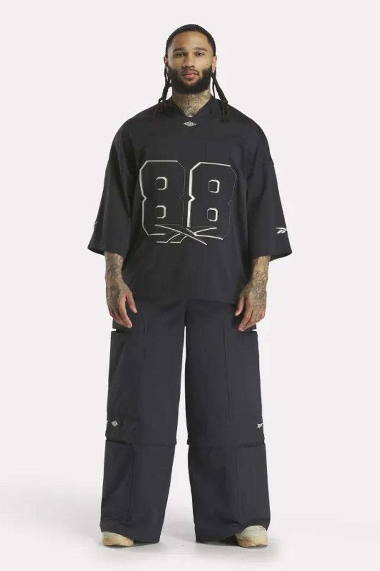 UNISEX RBK TOBE ZIP PANT BLACK 1