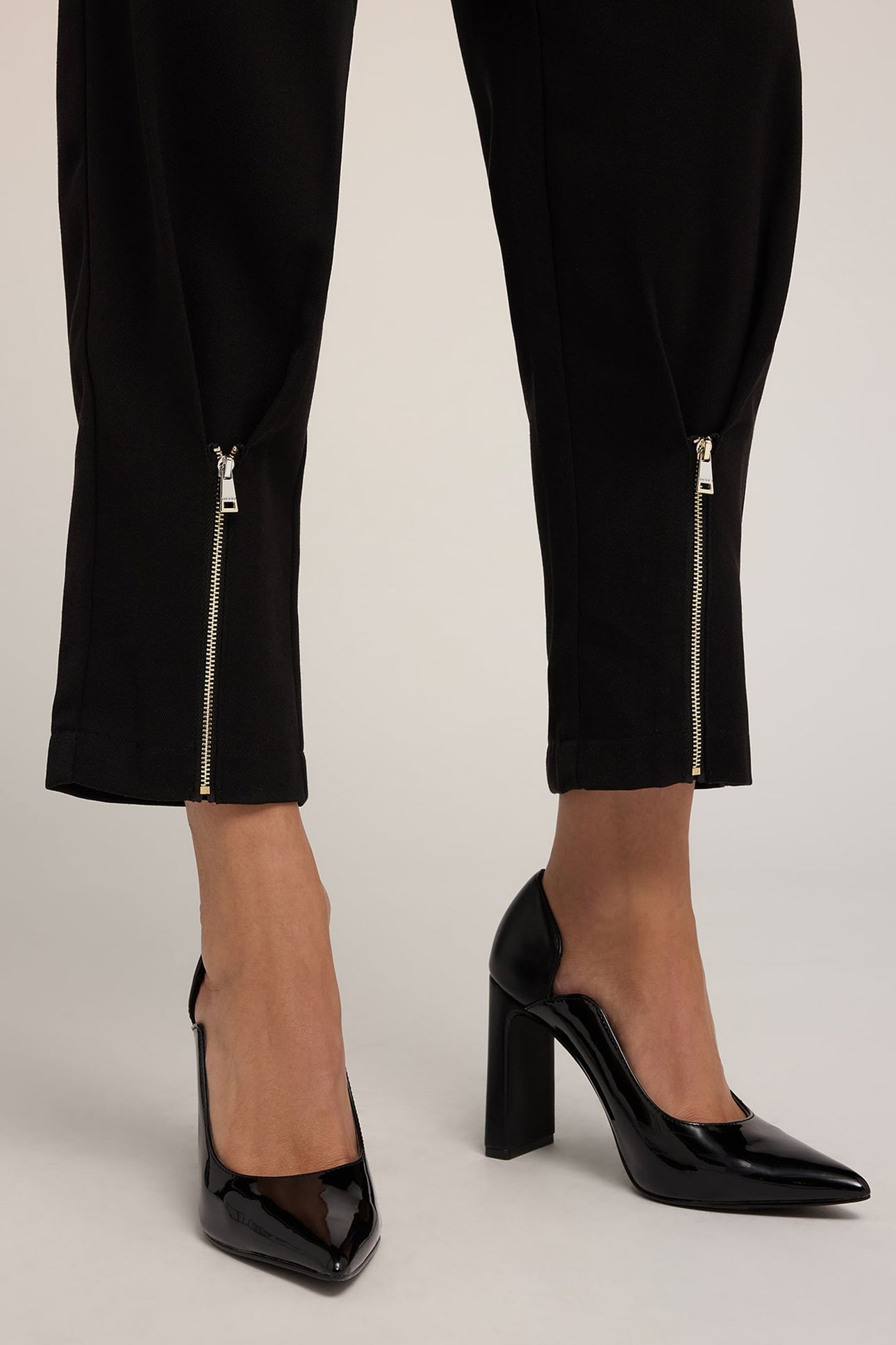CARROT PANTS WITH ZIP AT THE BOTTOM BLACK 5