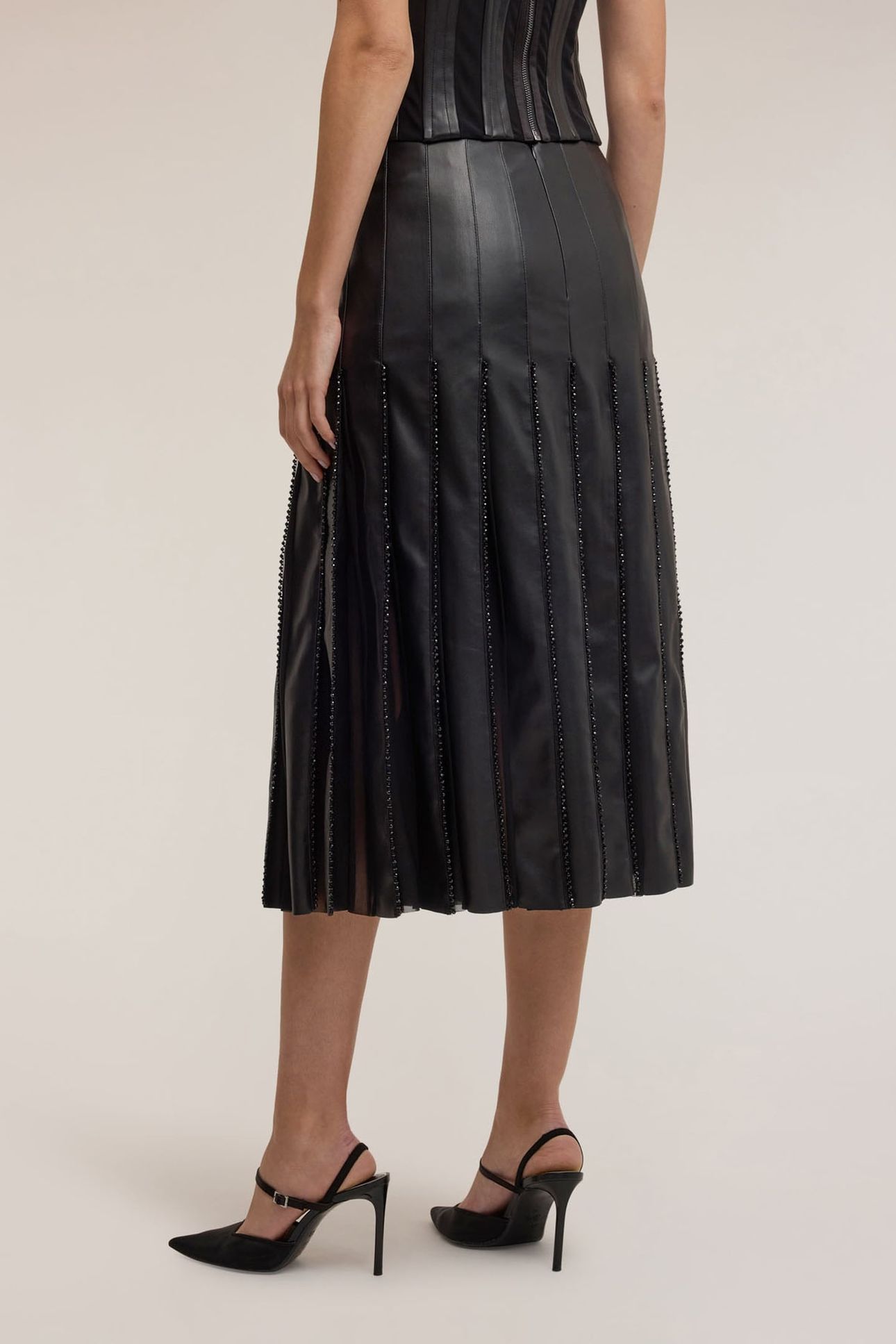 PLEATED SKIRT IN SMART COUTURE COATED FABRIC BLACK 2