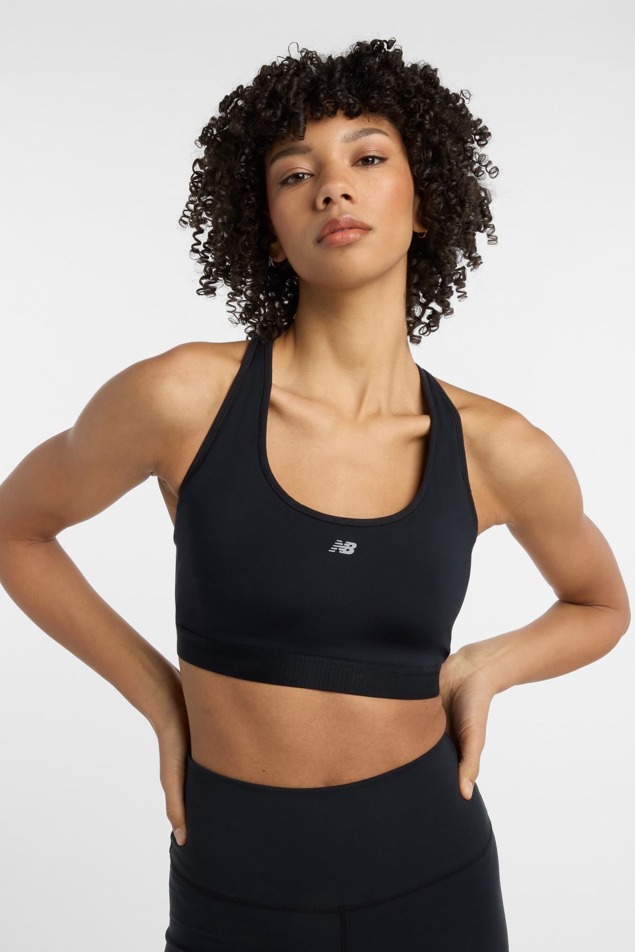 NB ESSENTIAL RUN BRA BLACK 1