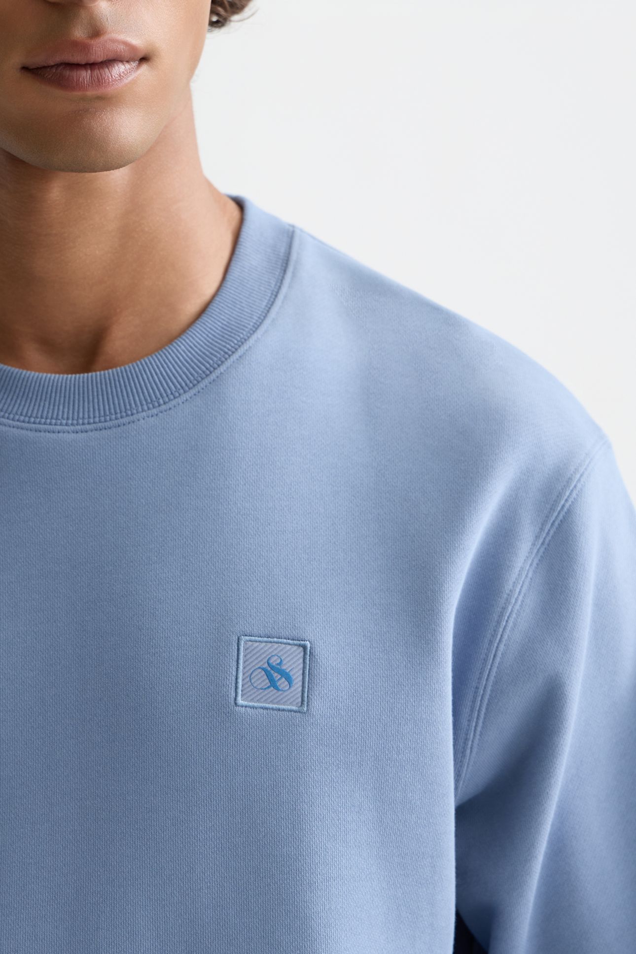 SEASONAL CORE LOGO BADGE REGULAR-FIT SWEATSHIRT NAVY 5