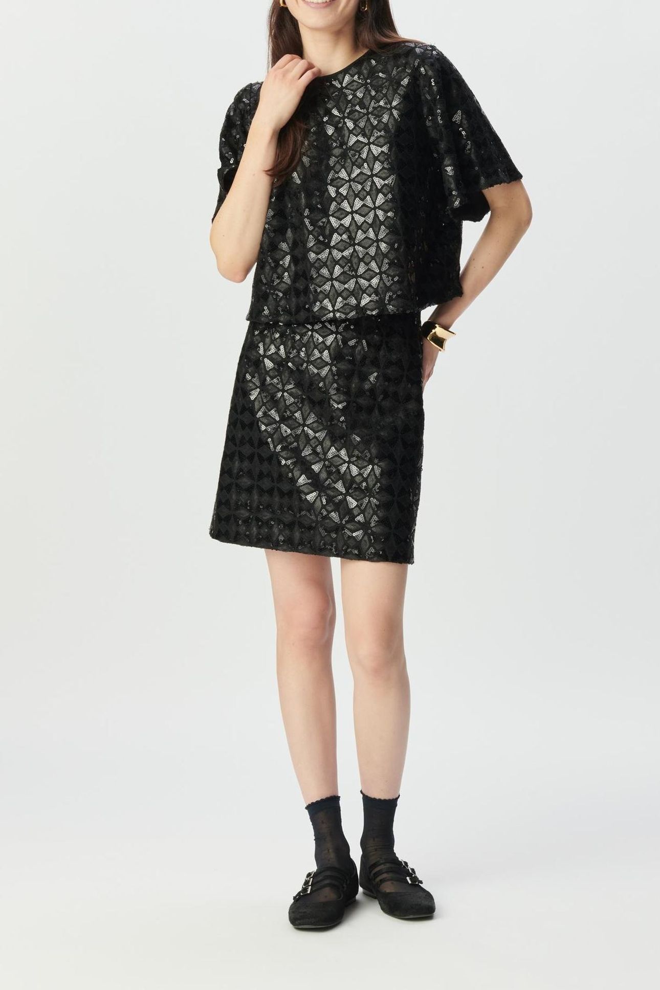 BLACK SKIRT WITH GRAPHIC SEQUIN EMBROIDERY 1