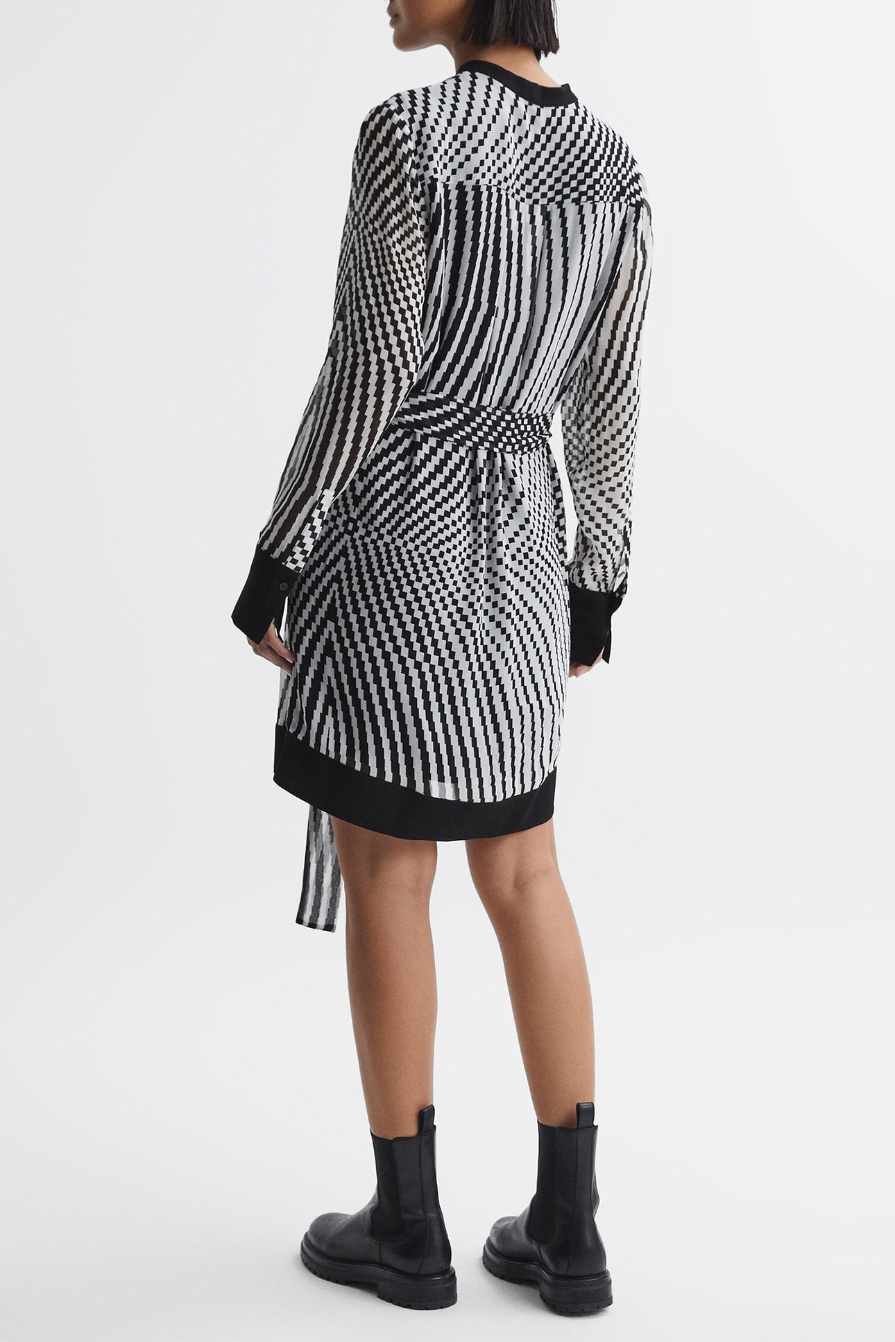 CHECK FLIPPY MINI DRESS — THE MODEL IS WEARING A SIZE 8 3
