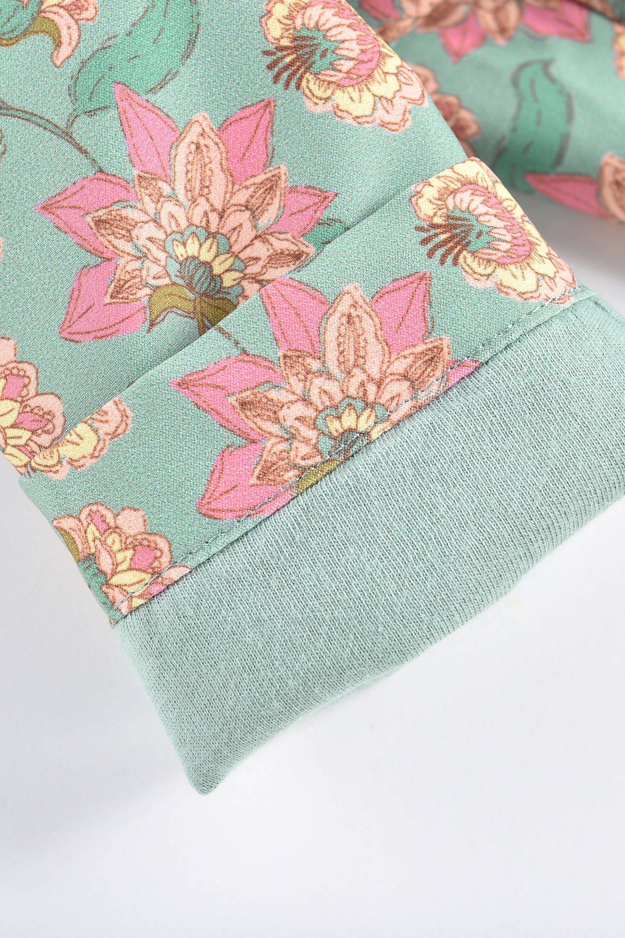 RAINCOAT MANOUKIA TURQUOISE FLOWERS 5