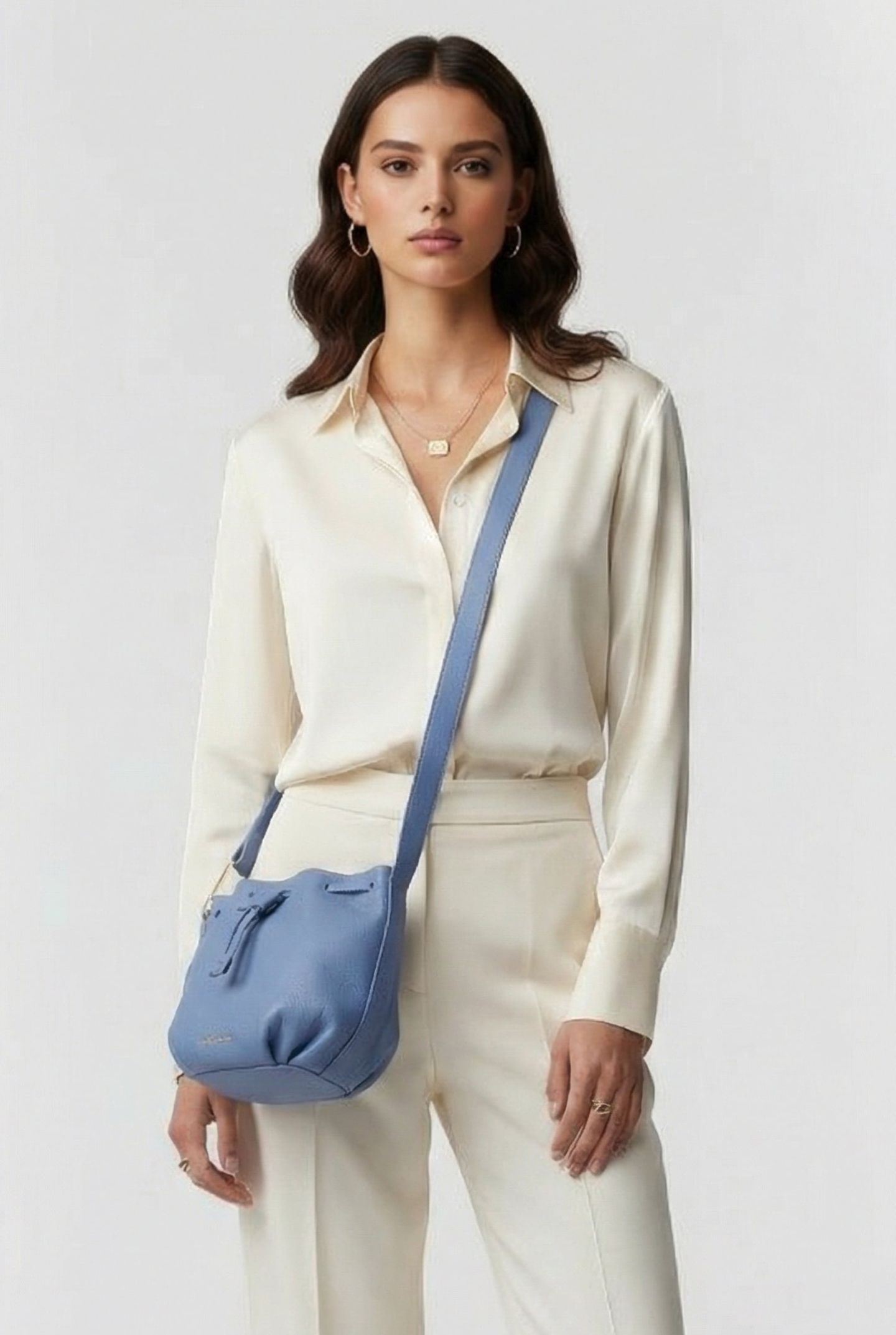 GRAINED LEATHER CROSS BODY BAG IN LIGHT BLUE 1