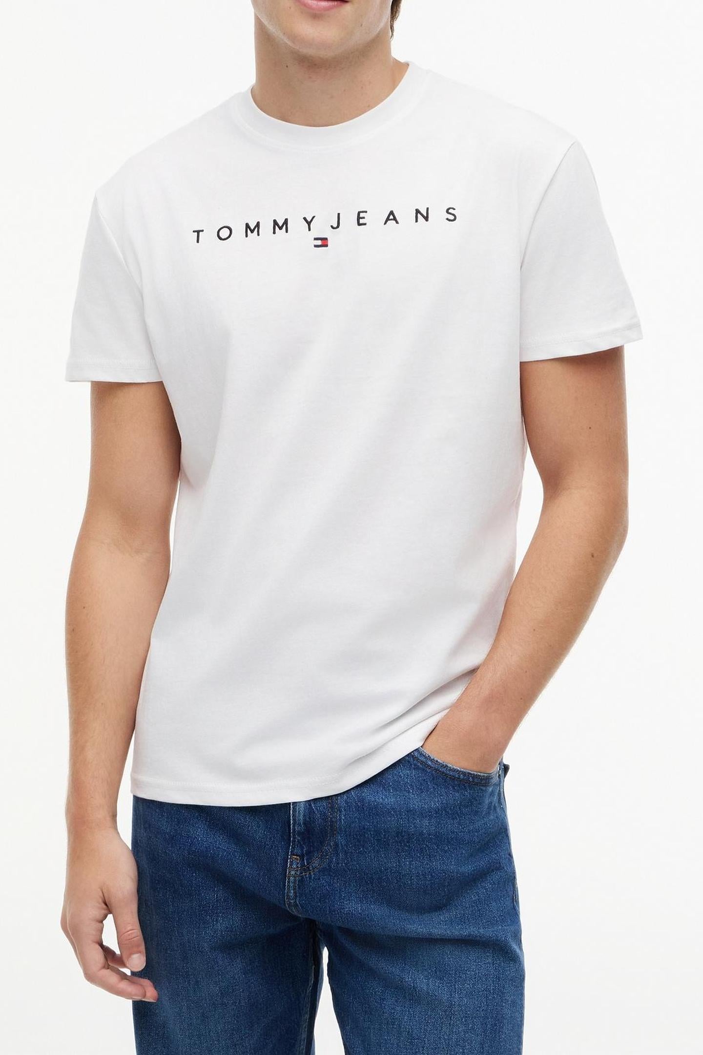 TJM REG LINEAR LOGO WHITE 1