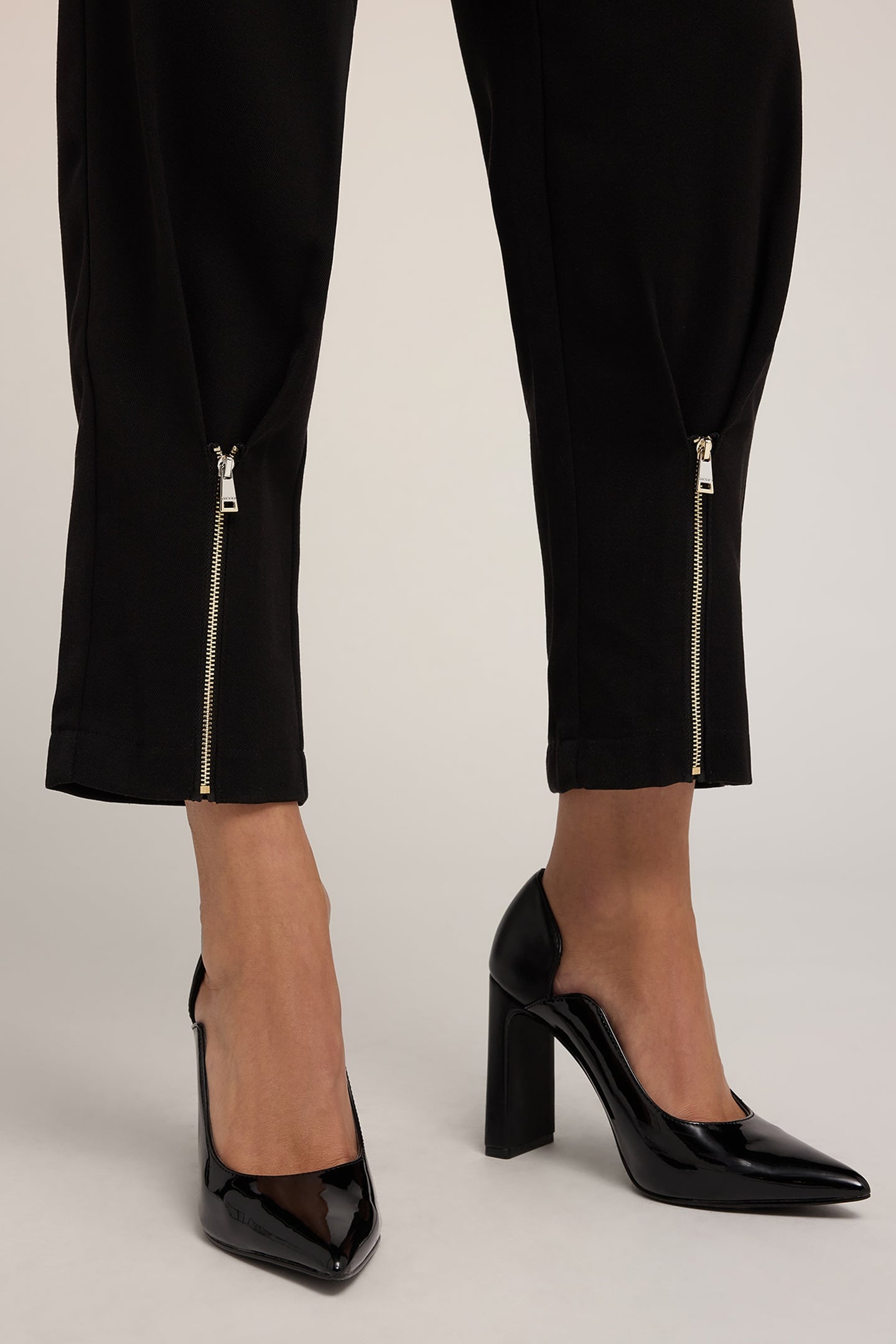 CARROT PANTS WITH ZIP AT THE BOTTOM BLACK 5