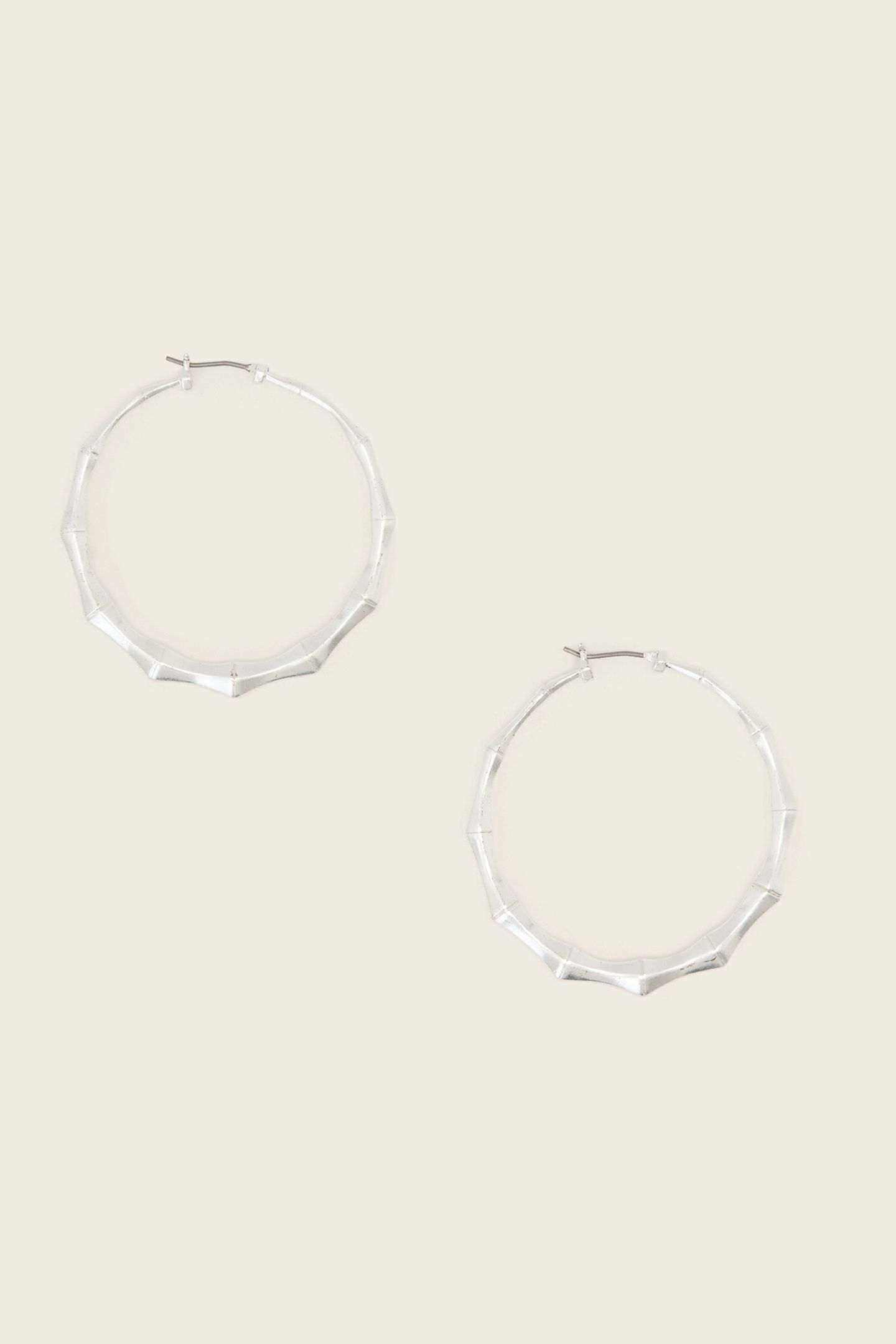 CLARA MED HOOP WARM SILVER 1