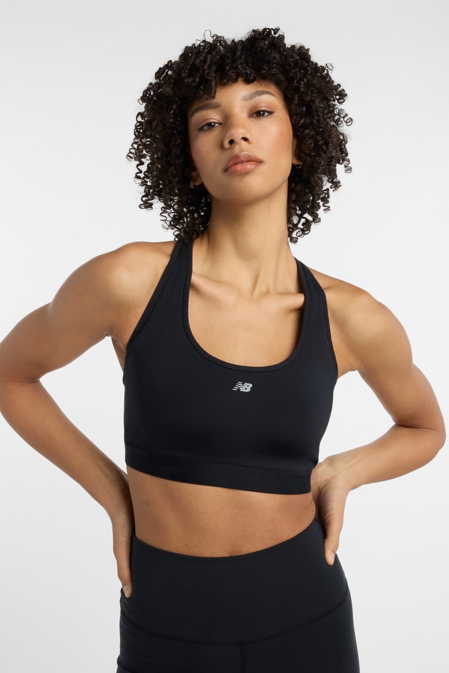 NB ESSENTIAL RUN BRA BLACK 1