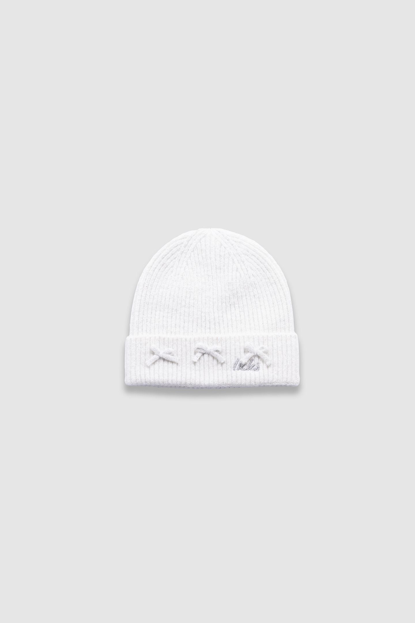 GIRLS’ WHITE GLITTERY KNIT BEANIE WITH BOW 1