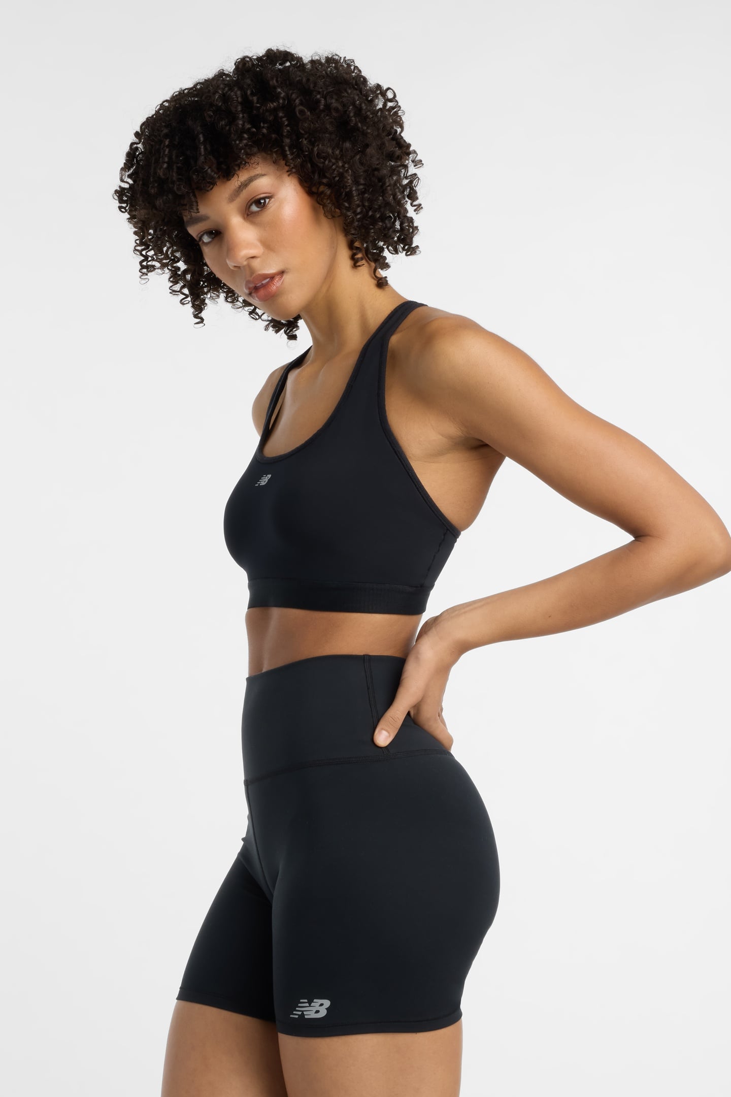 NB ESSENTIAL RUN BRA BLACK 6