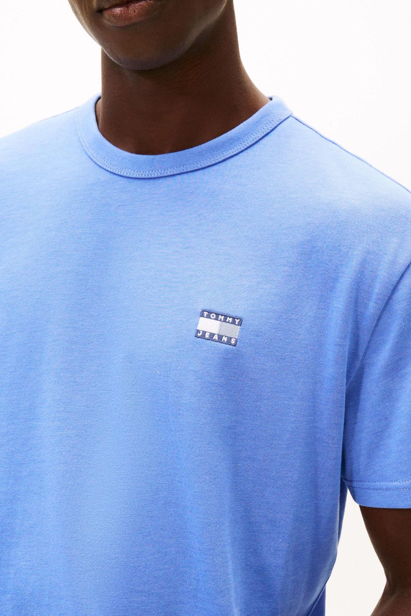 TJM REG BADGE TEE LIGHT HORIZON BLUE HEATHER 5