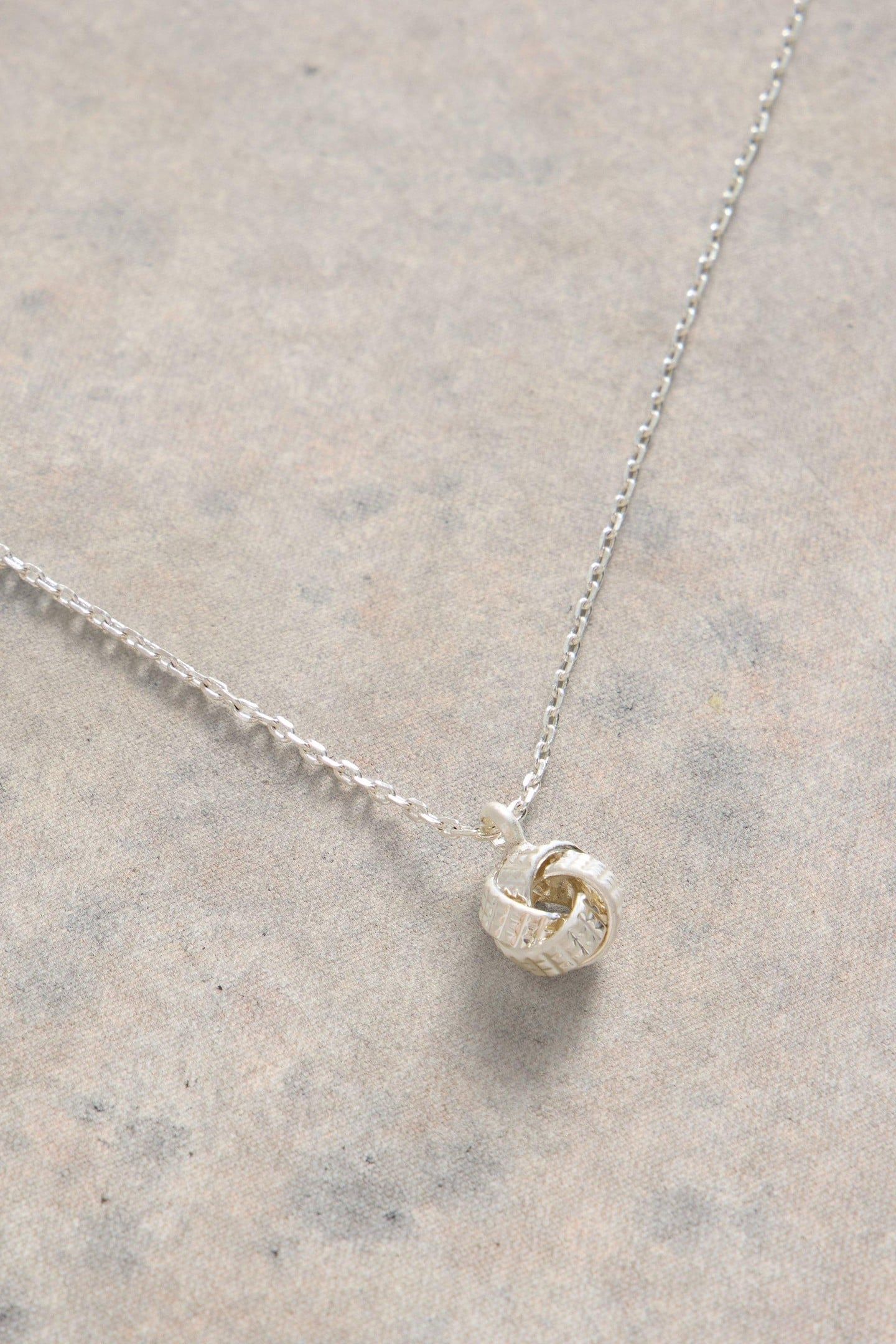 KNOT CHARM FINE NECKLACE SILVER TONE METALLIC 1
