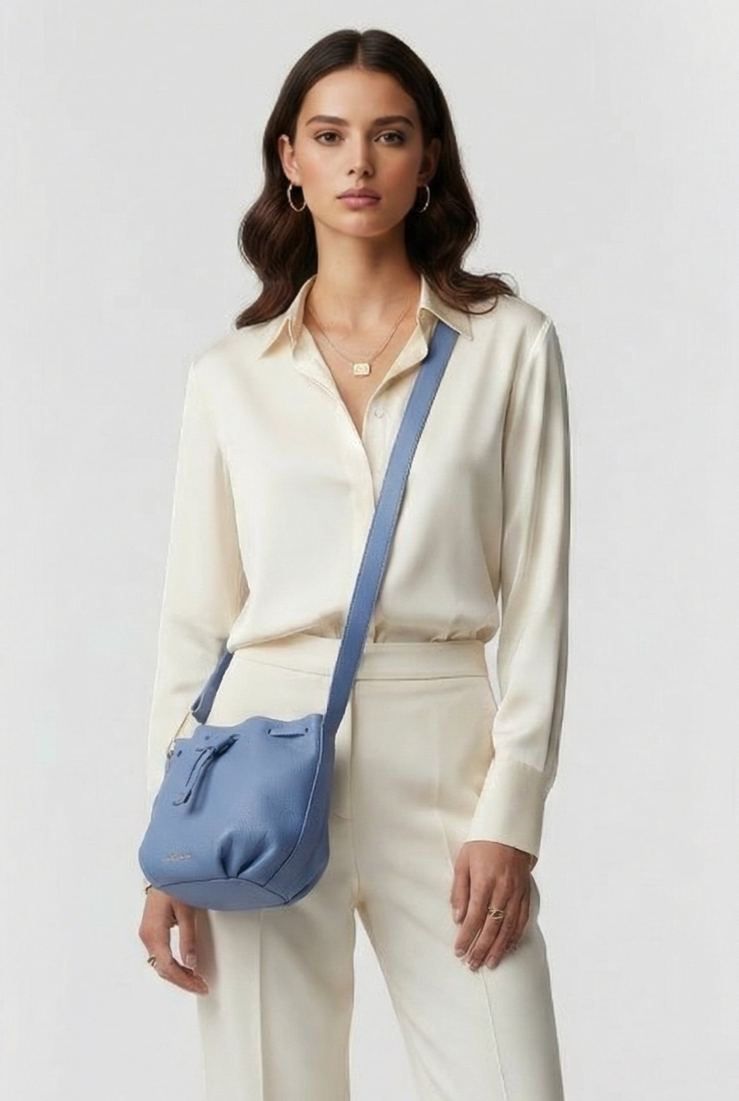 GRAINED LEATHER CROSS BODY BAG IN LIGHT BLUE 1