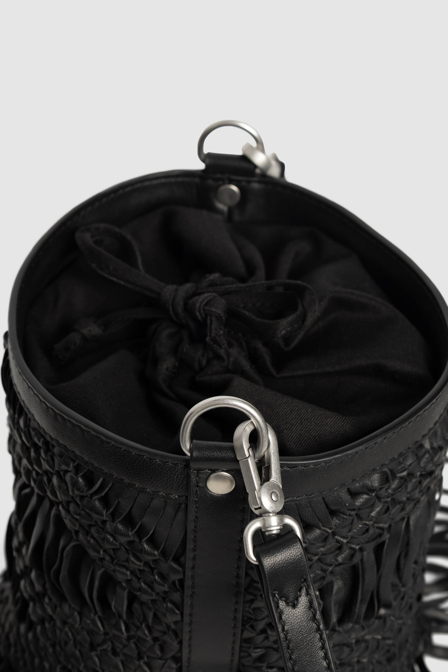 BLACK LEATHER MACRAMÉ-STYLE FRINGED BUCKET BAG 6