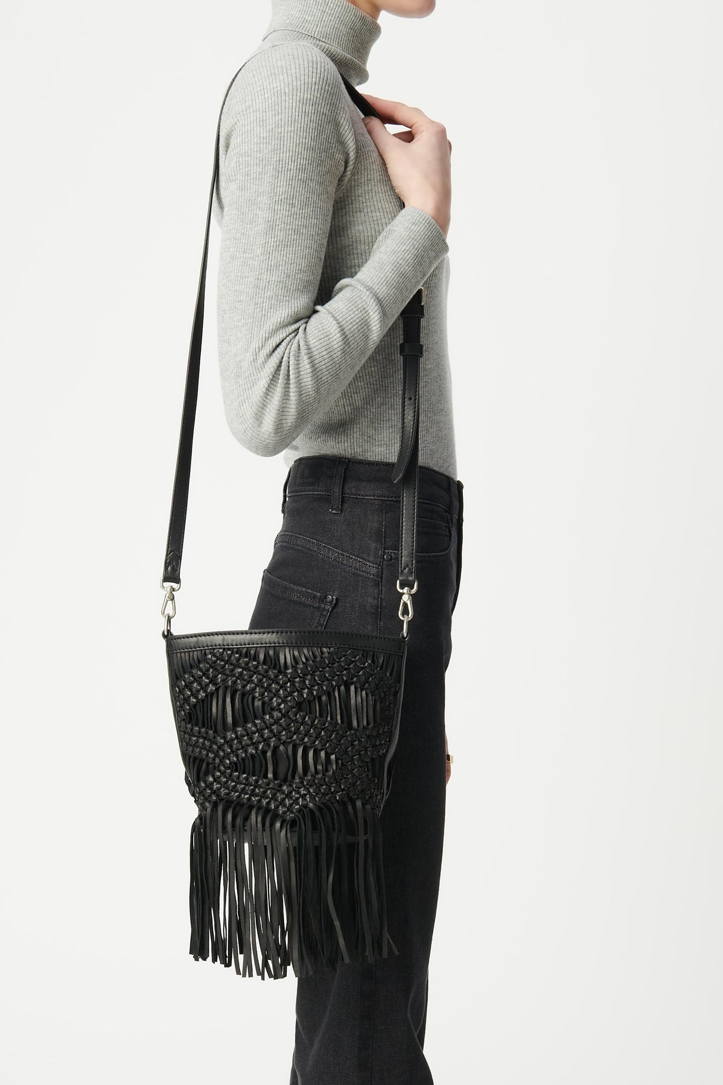 BLACK LEATHER MACRAMÉ-STYLE FRINGED BUCKET BAG 1