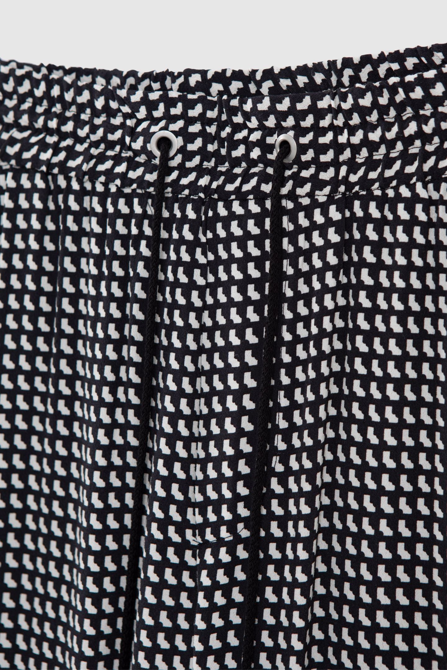BLACK LENZING™ ECOVERO™ GRAPHIC PRINT TROUSERS 7