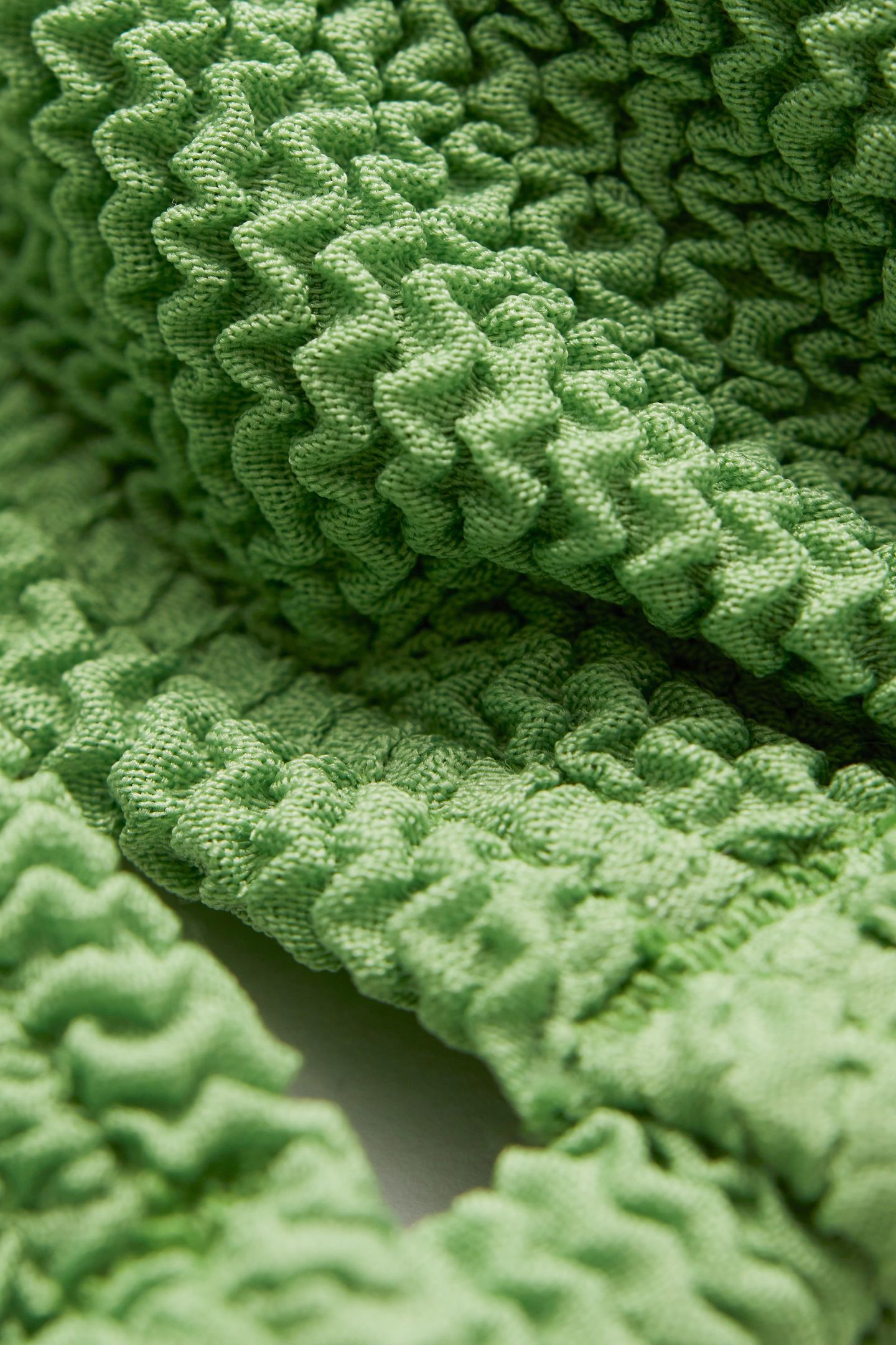 PAGE TRIANGLE TOP GREEN 3