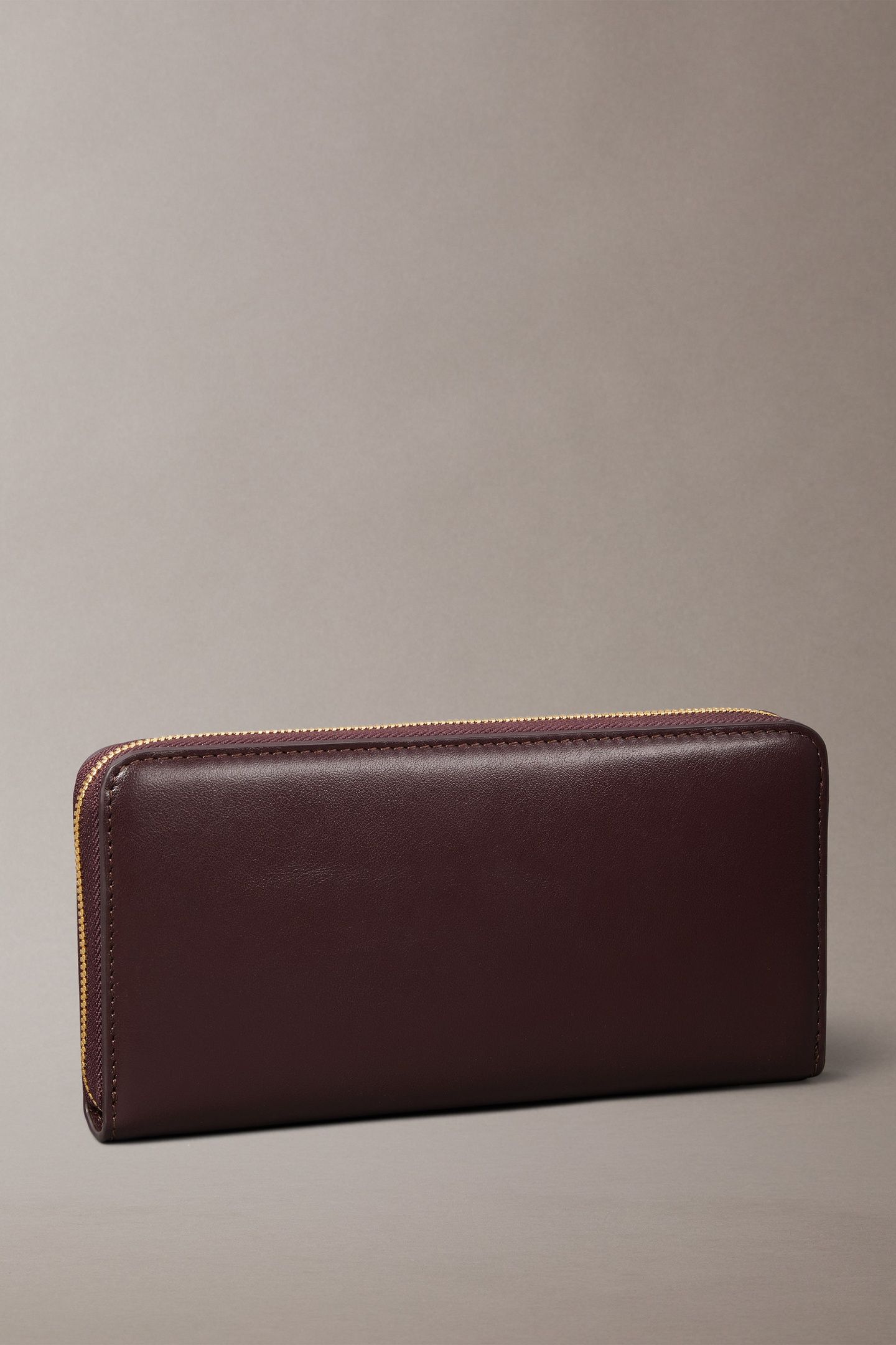 CK LARGE ZIP AROUND WALLET FUDGE 2