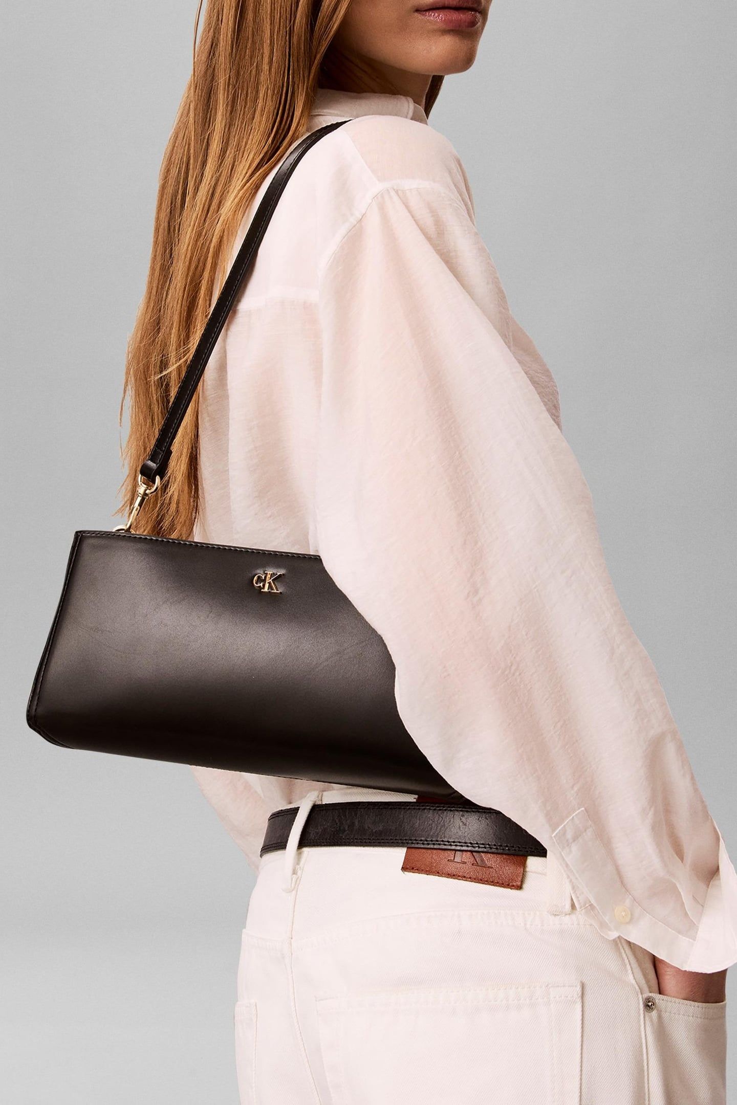 CK ELONGATED SHOULDER BAG BLACK 1