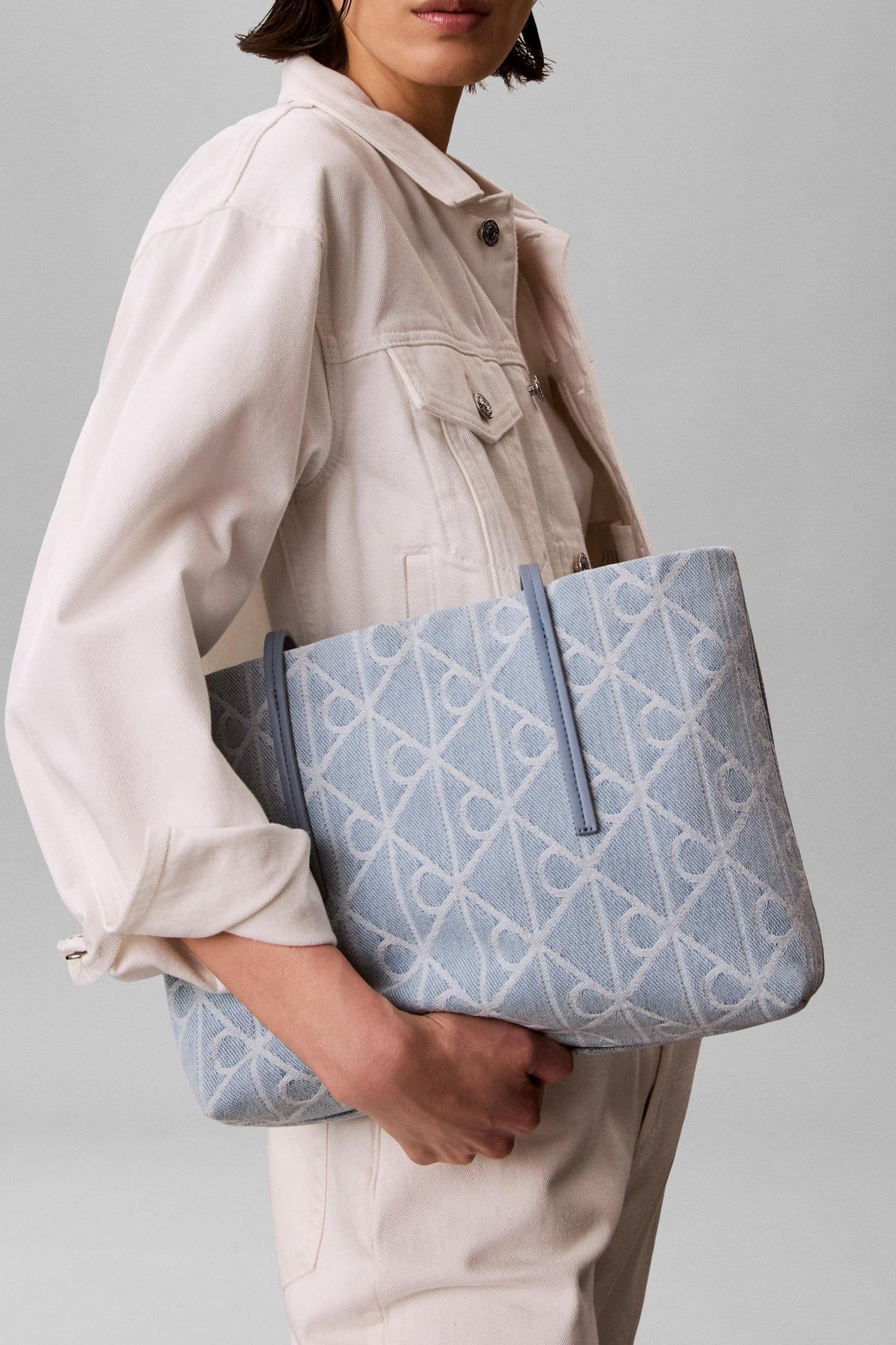 EMBLEM ALL-OVER PRINT DENIM SMALL BAG LIGHT WASH 1