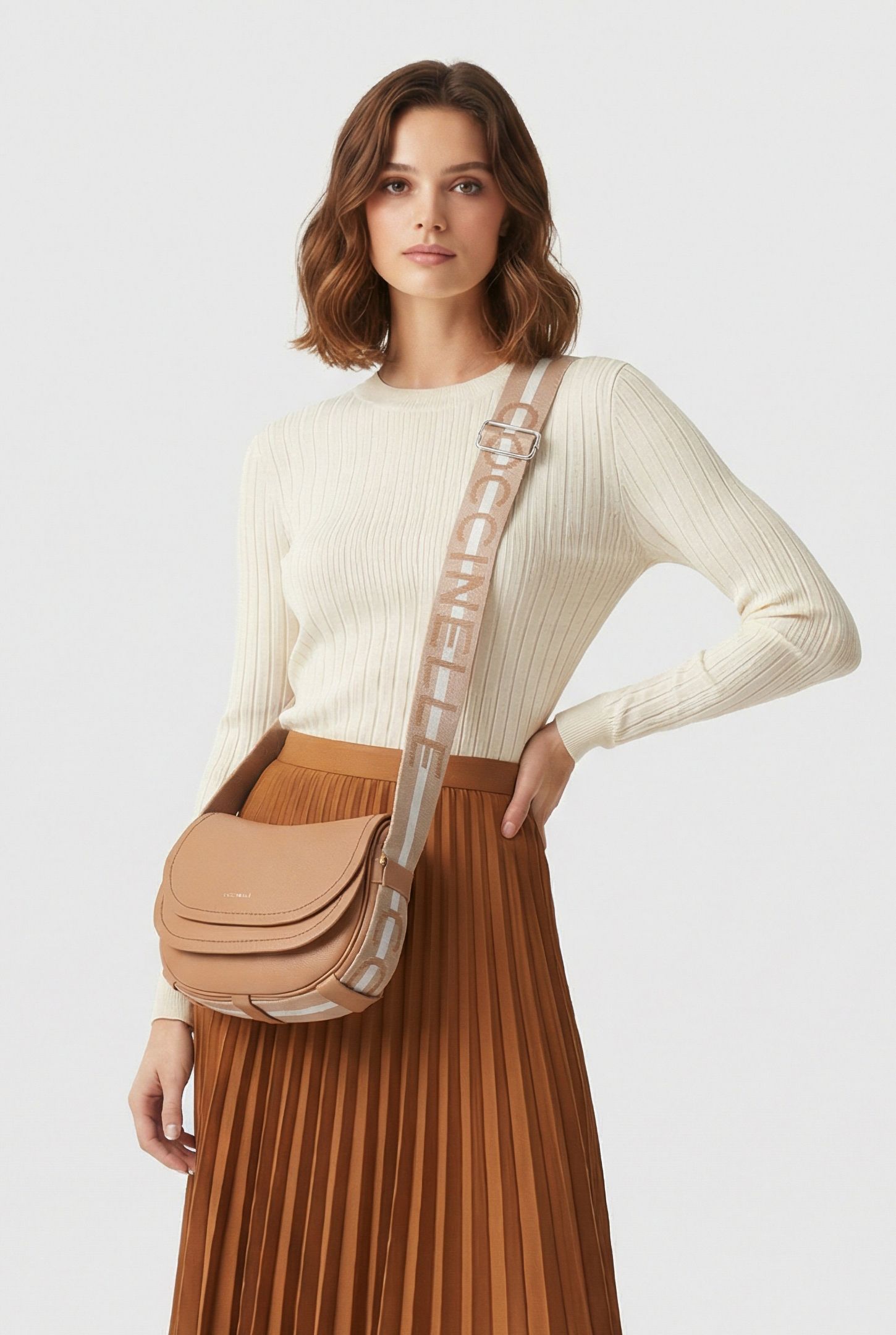 CROSS BODY BAG WITH LOGO STRAP IN BEIGE 1