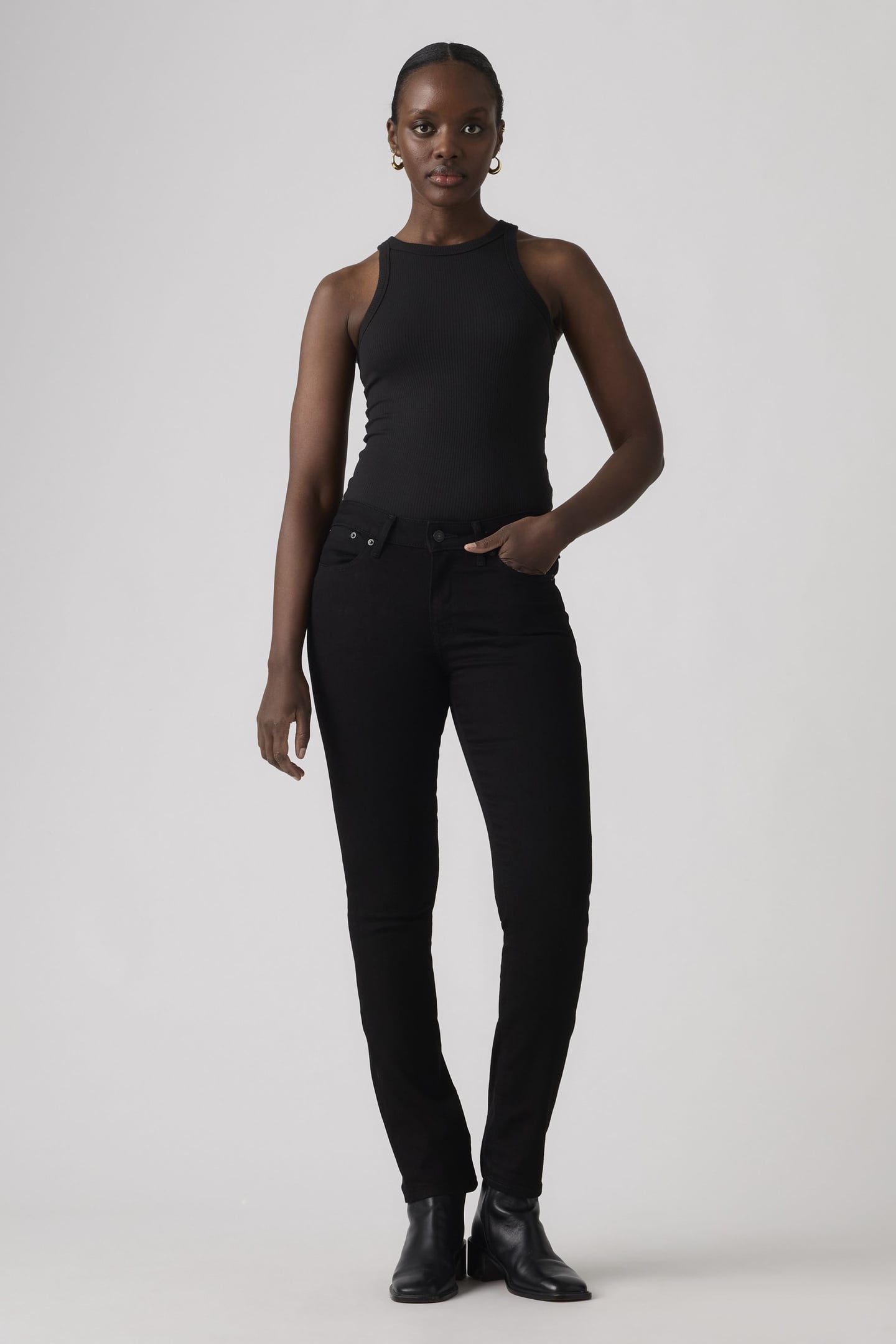 712 SLIM WELT POCKET JEANS 1