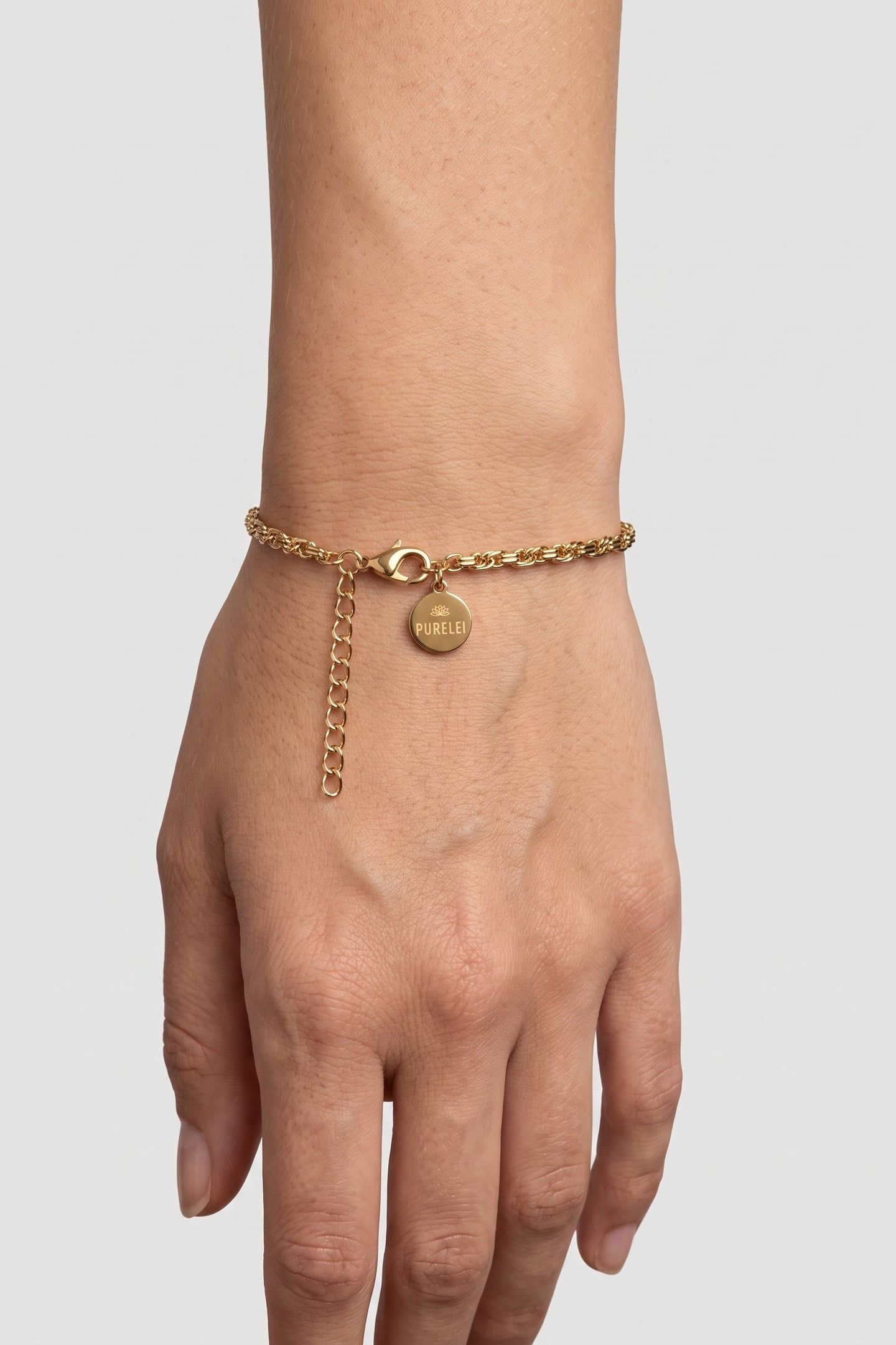 MOTIONS ARMBAND GOLD 1