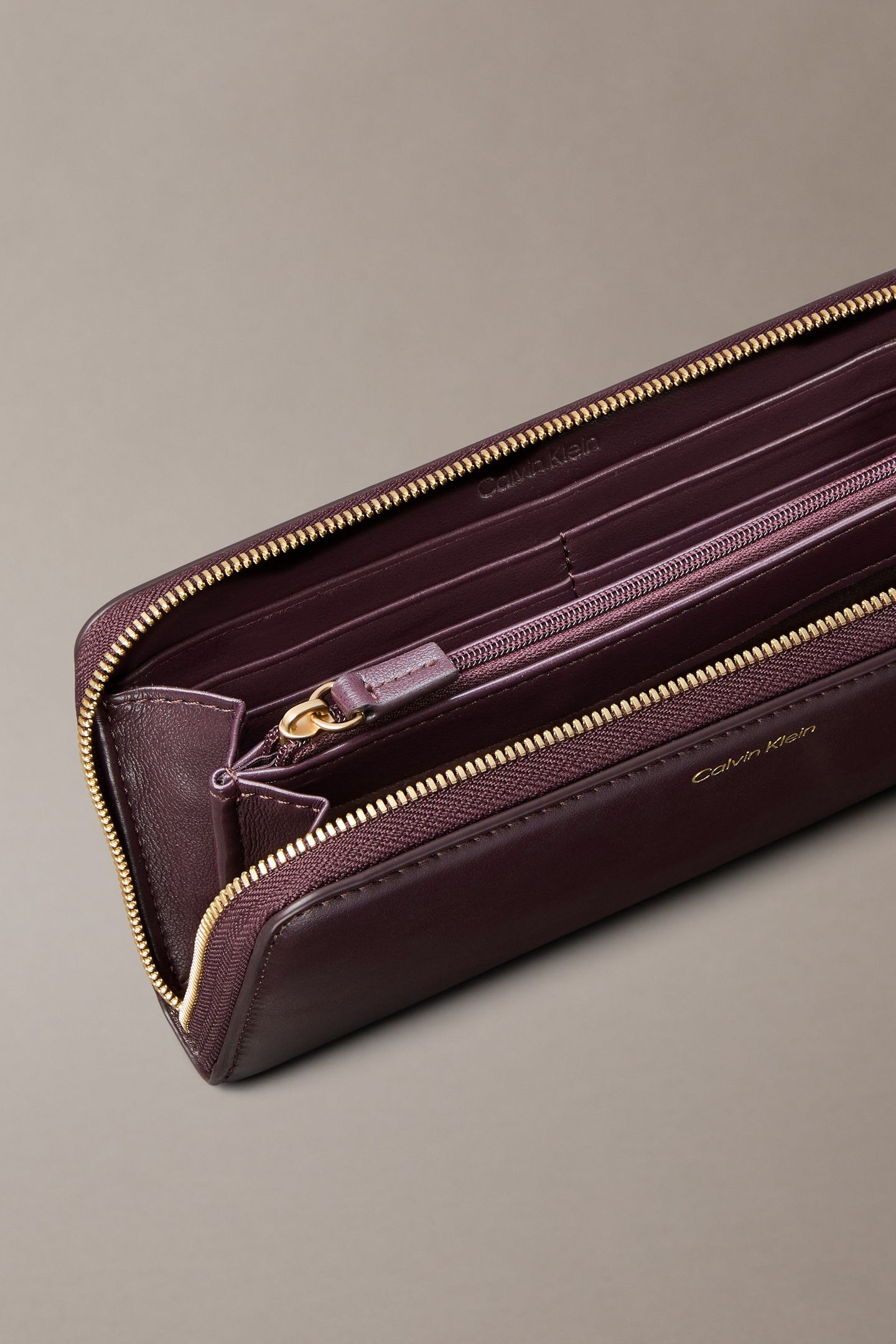CK LARGE ZIP AROUND WALLET FUDGE 3