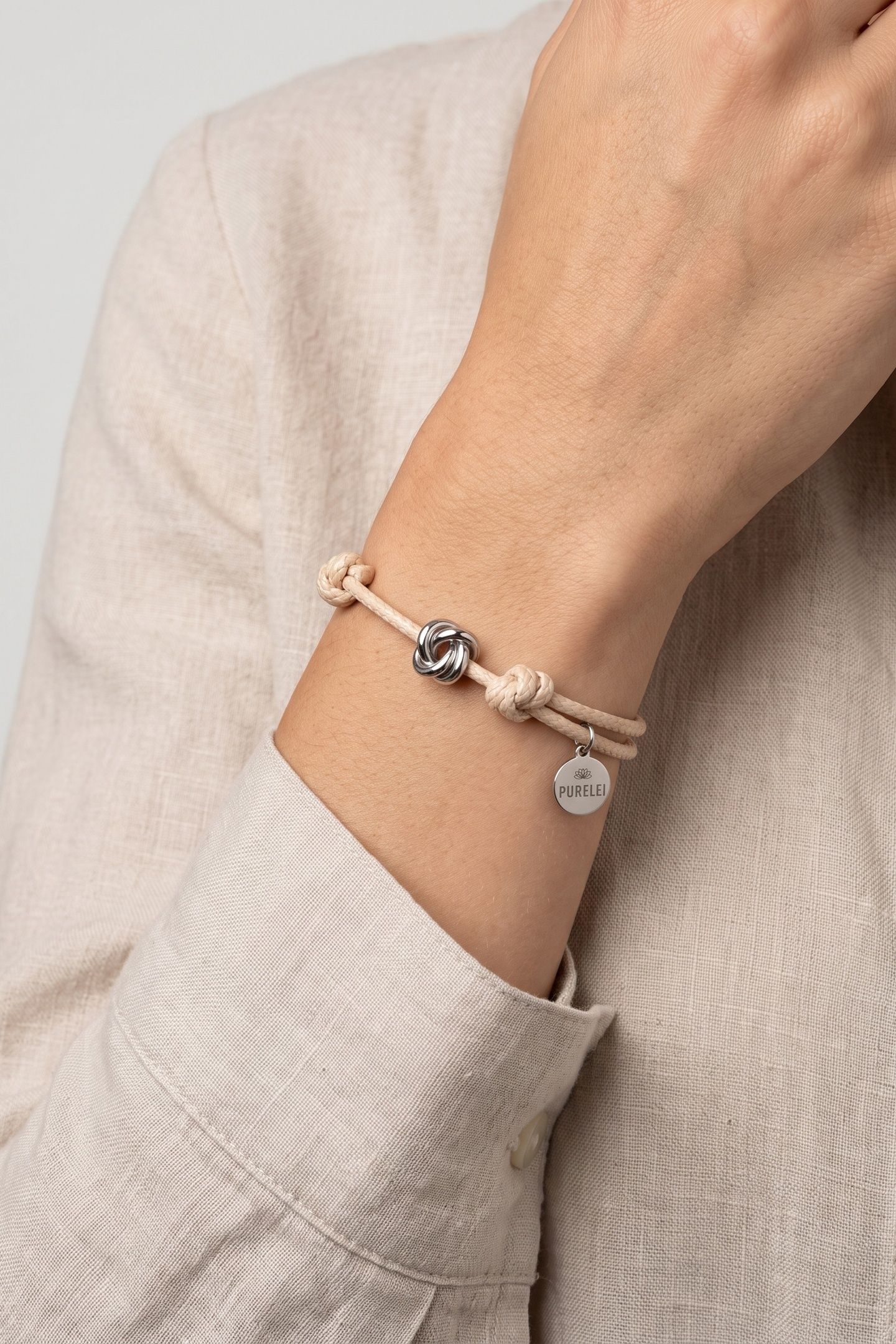 KNOT ARMBAND SILVER 1