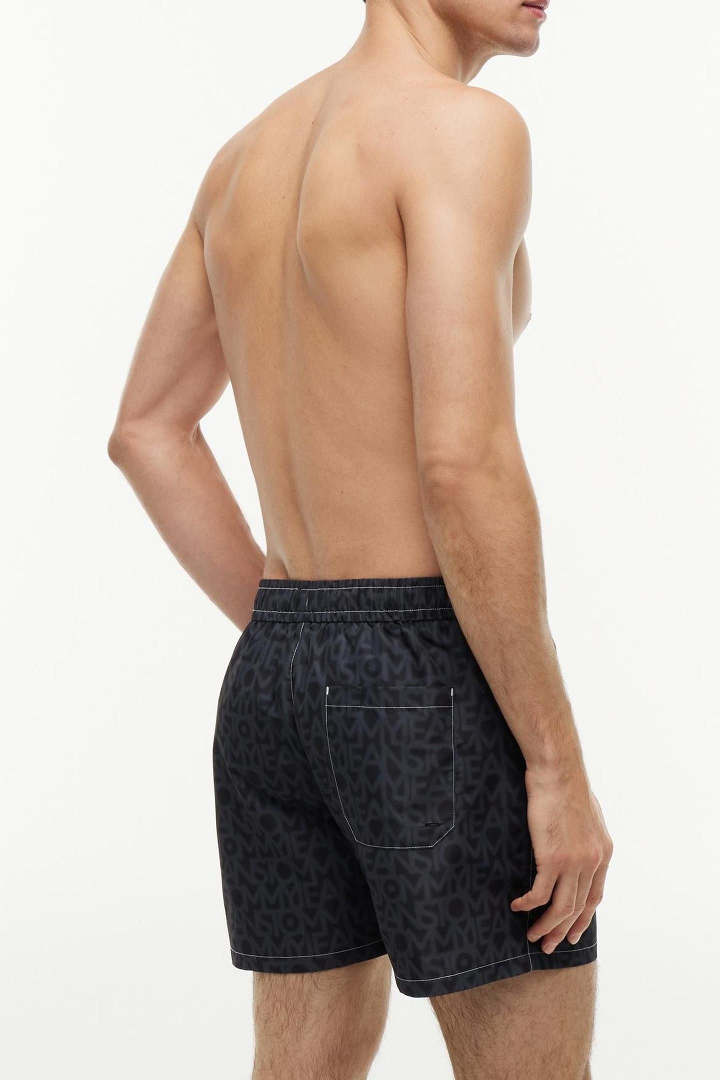 TJ MEDIUM DRAWSTRING TJ SUNBLEACHED SPELLOUT BLACK 2