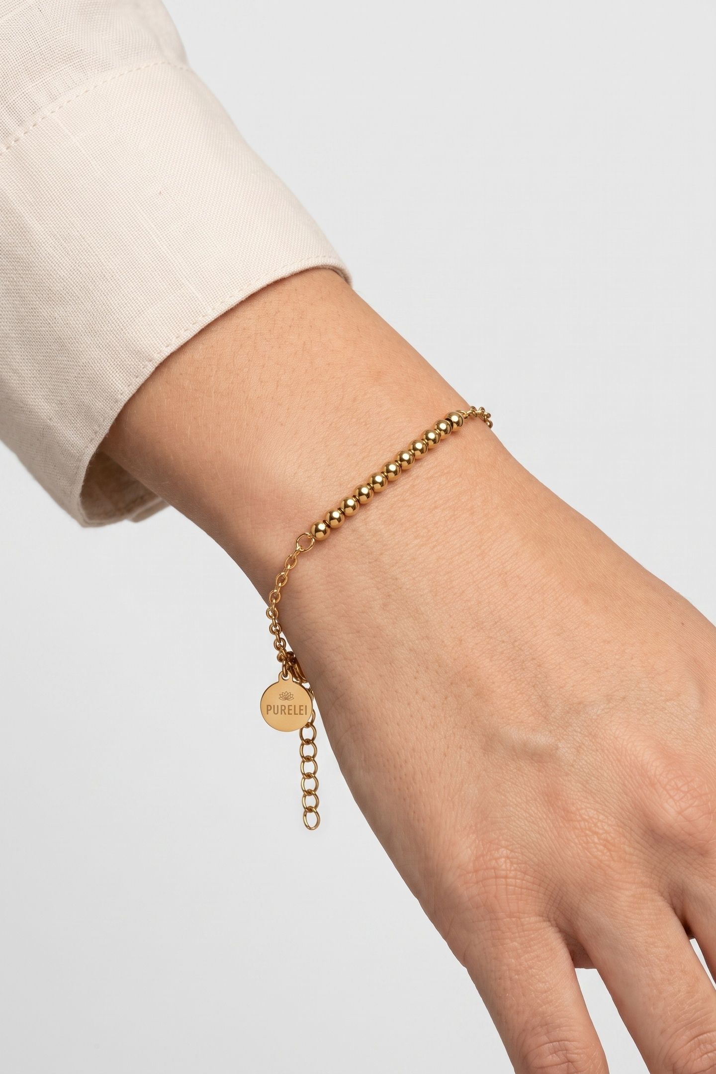 ANXIETY ARMBAND GOLD 1