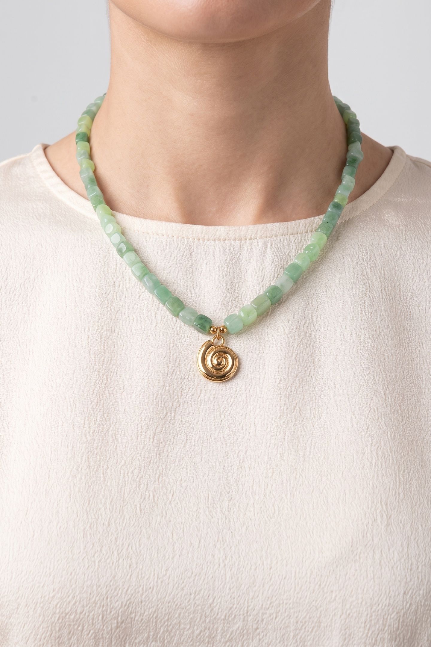 SUNDIAL SHELL JADE KETTE GOLD 1