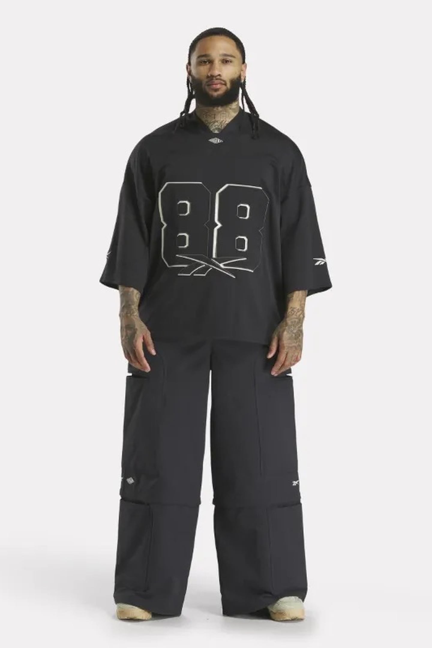 UNISEX RBK TOBE ZIP PANT BLACK 1