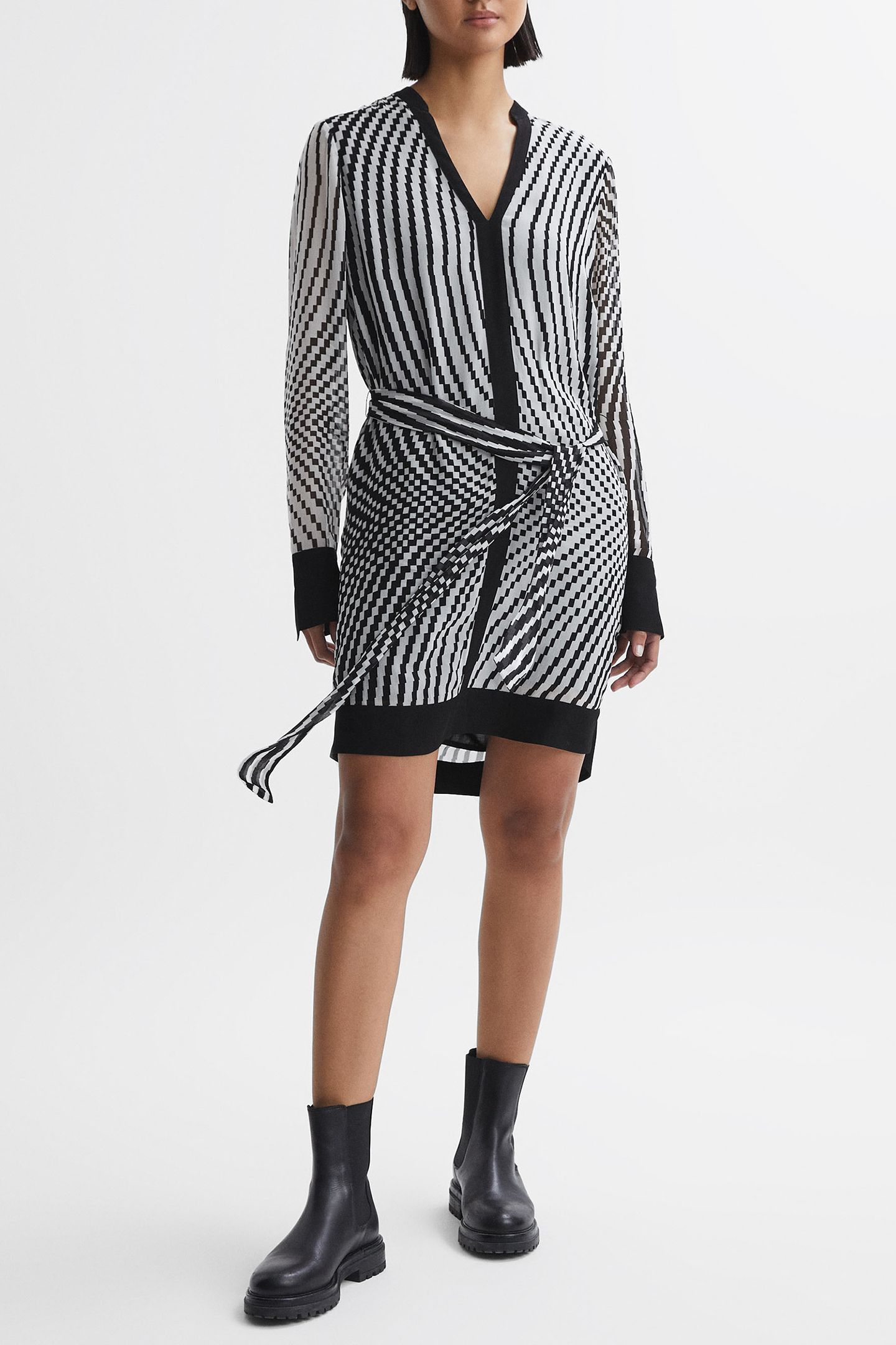CHECK FLIPPY MINI DRESS — THE MODEL IS WEARING A SIZE 8 2
