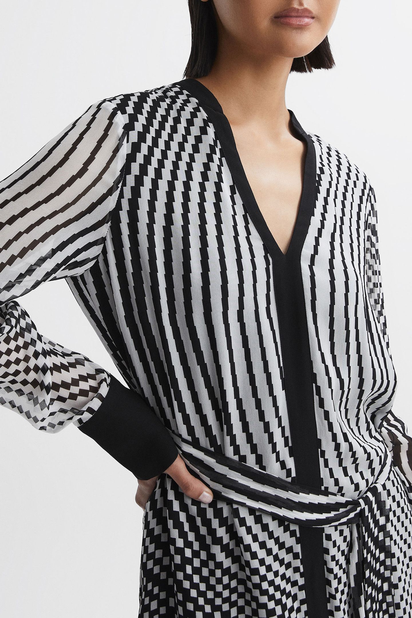 CHECK FLIPPY MINI DRESS — THE MODEL IS WEARING A SIZE 8 5