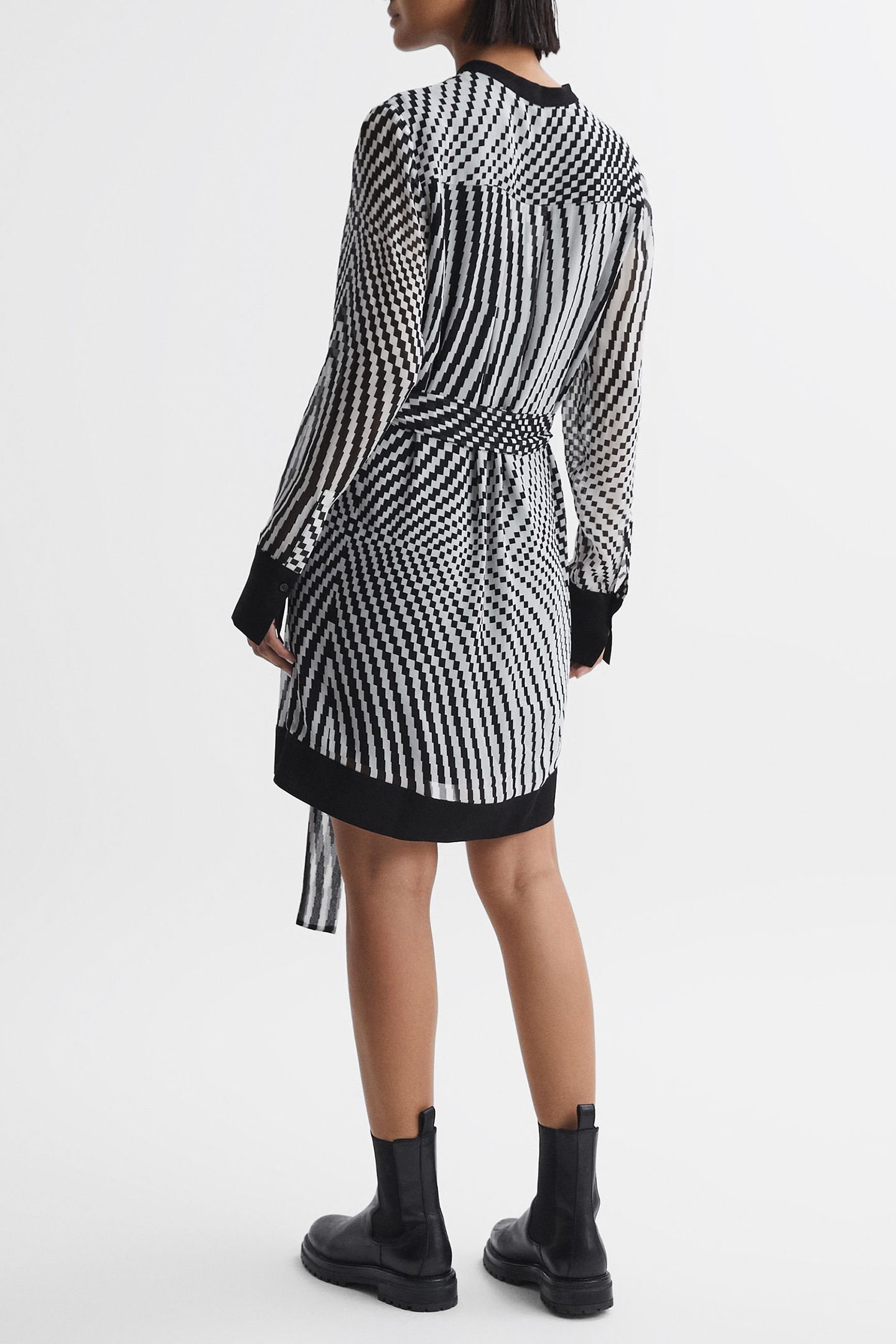 CHECK FLIPPY MINI DRESS — THE MODEL IS WEARING A SIZE 8 3