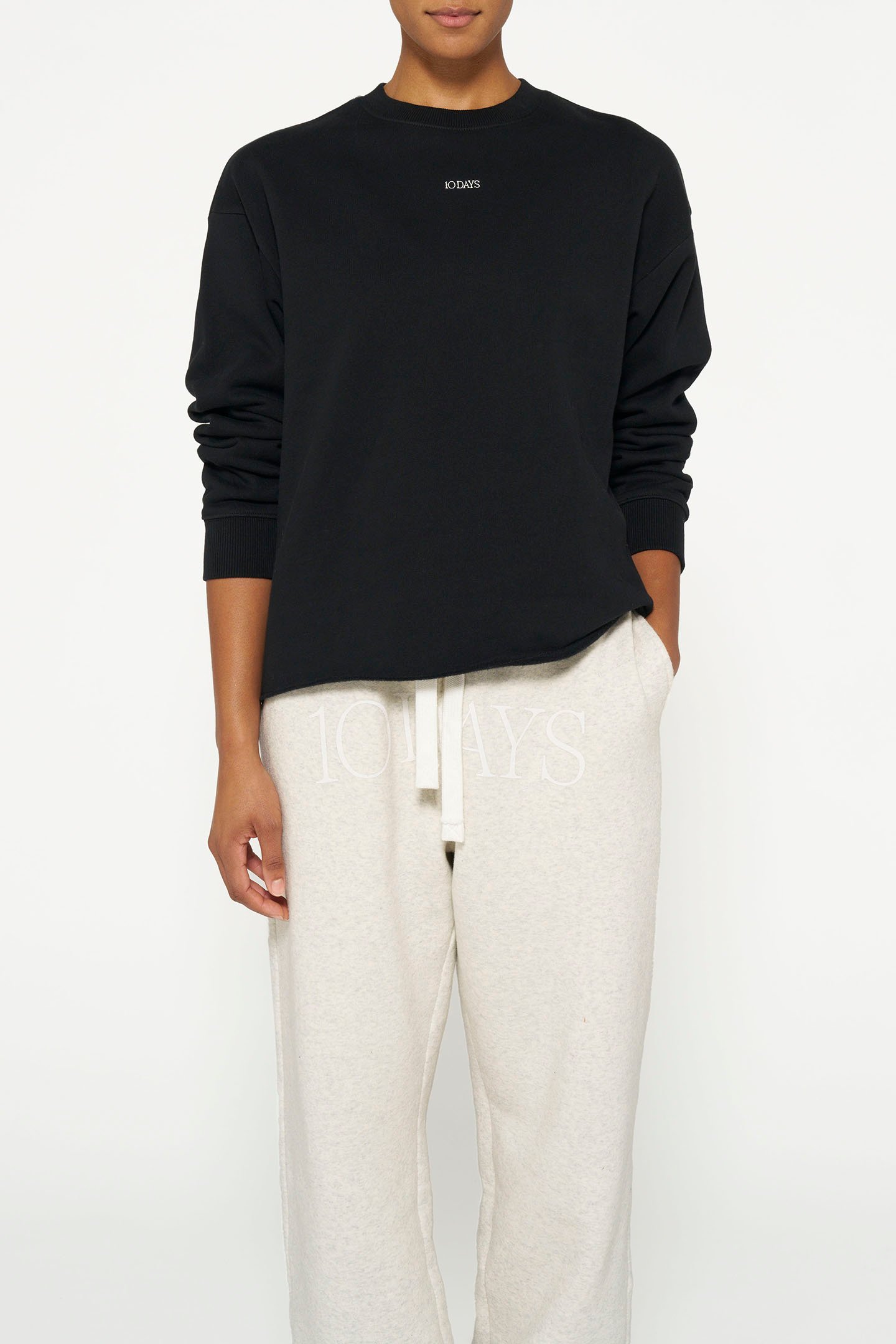 THE SWEATER LOGO BLACK 1