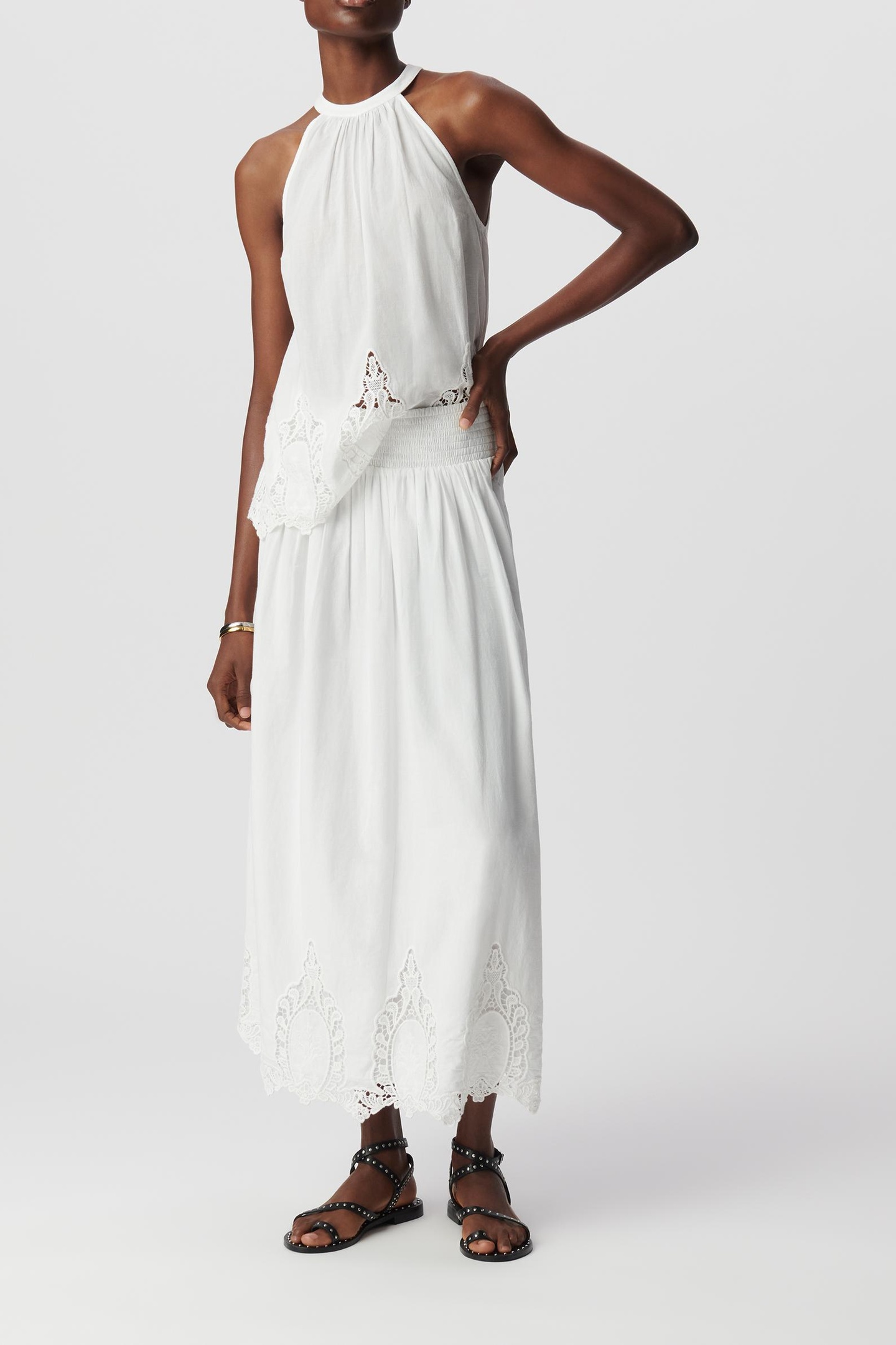 LONG WHITE SKIRT DECORATED WITH LACE EMBROIDERY 1