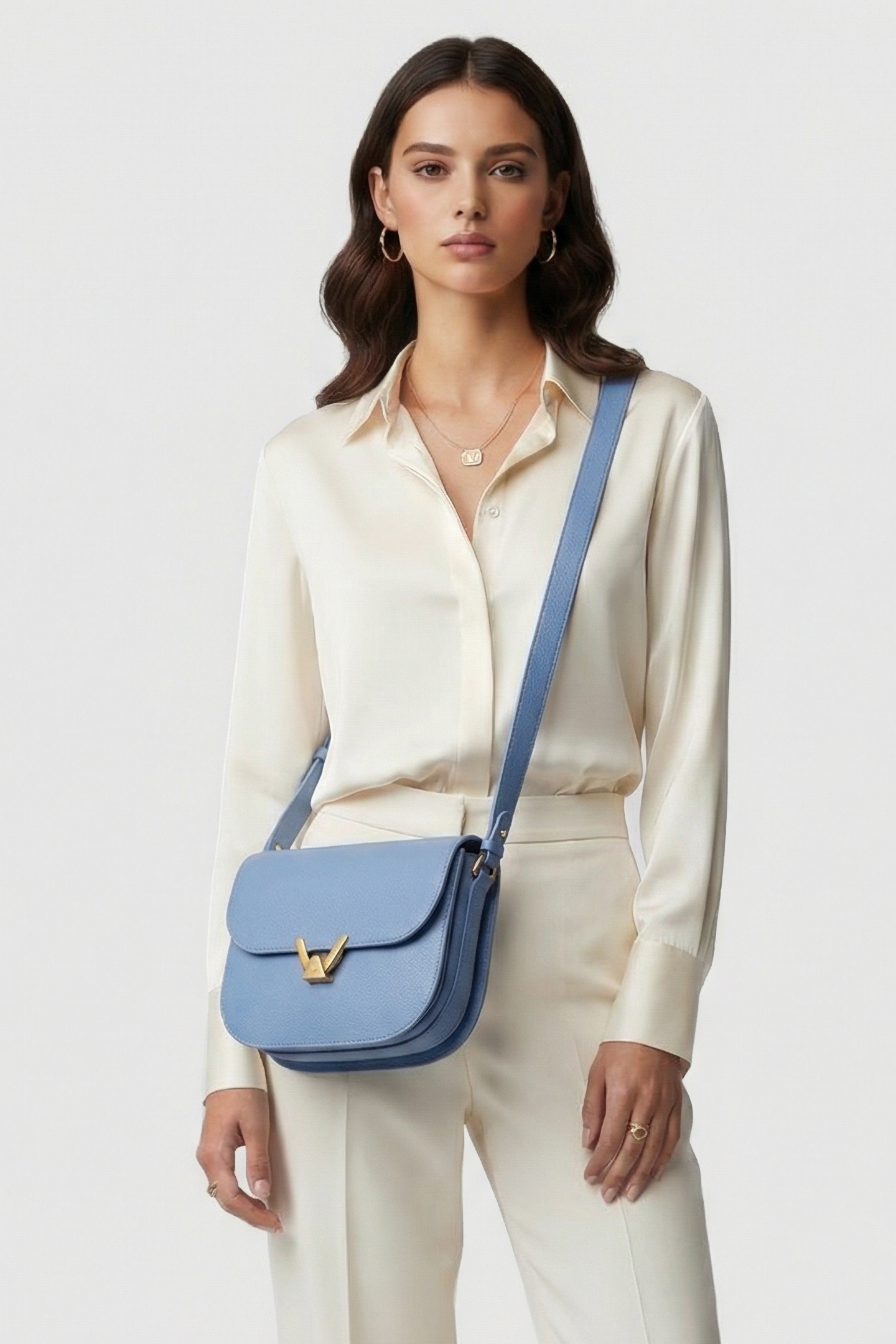 LEATHER CROSS BODY BAG IN BLUE 1