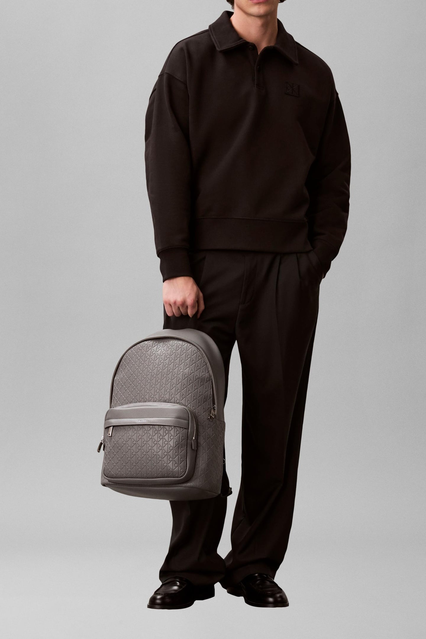 EMBLEM EMBOSS ROUND BACKPACK CHARCOAL GRAY 1