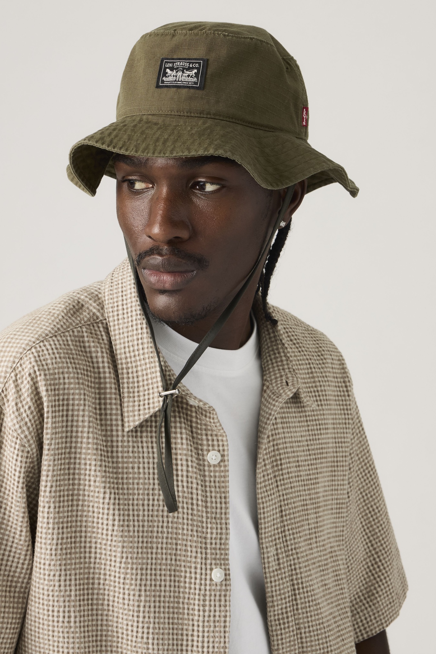Levi's Bay Drawstring Bucket Hat Maat: L | Petten Outlet | Heren | Bruin