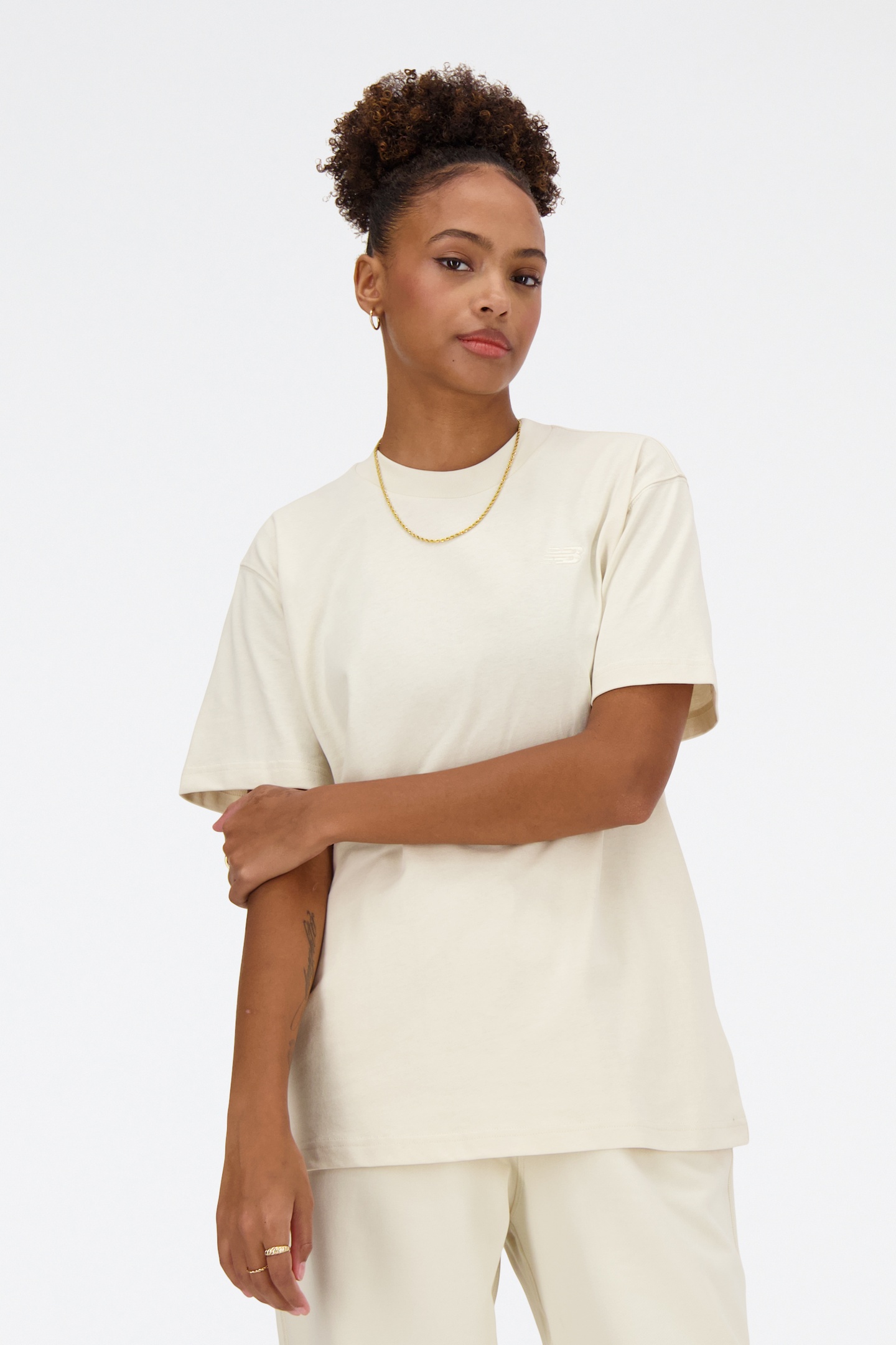 New Balance Athletics Jersey T-shirt Linen Maat: XS | Sport Shirts Outlet | Dames | Beige