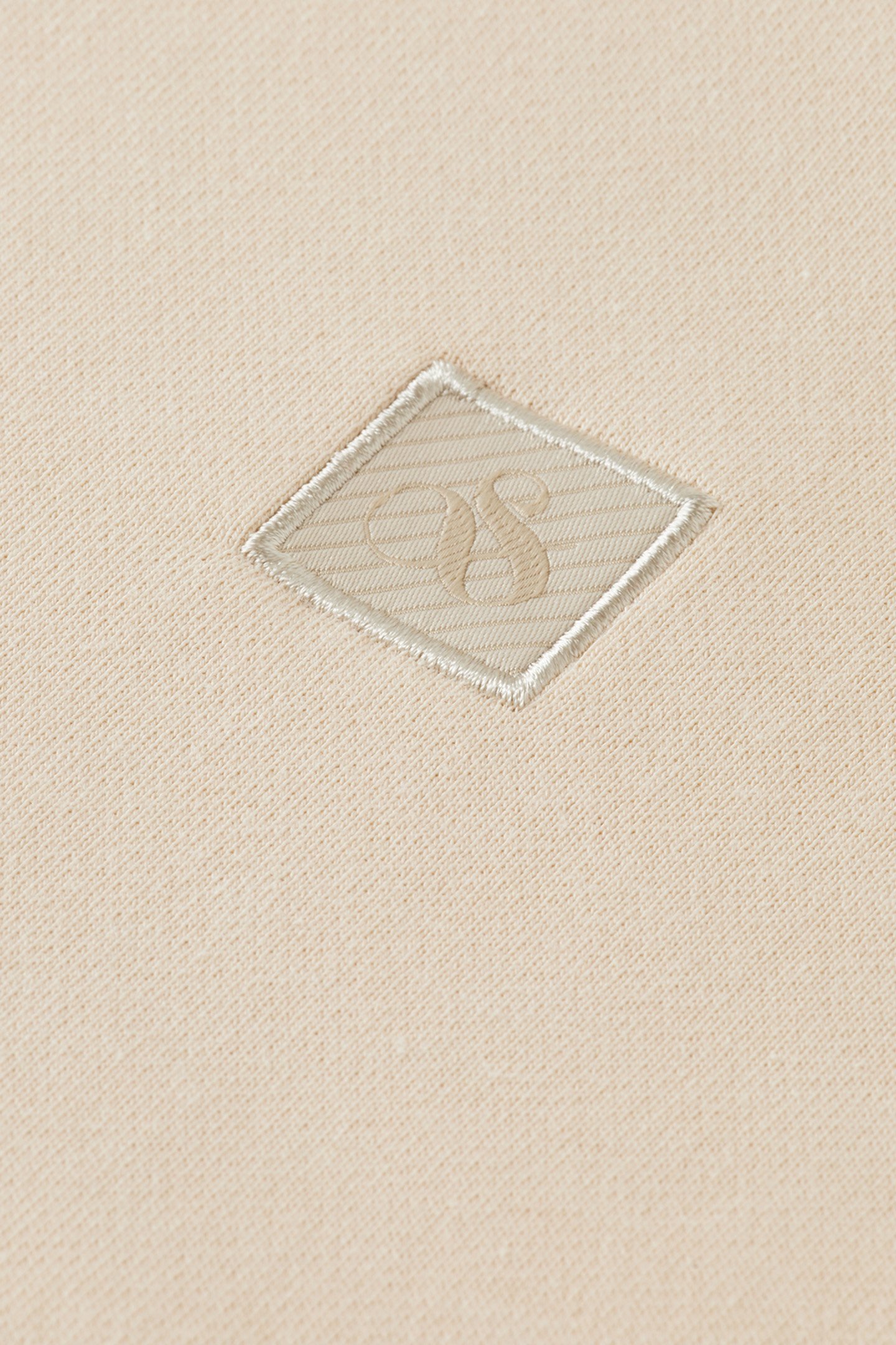 ESSENTIAL LOGO BADGE CREW PARCHMENT 9