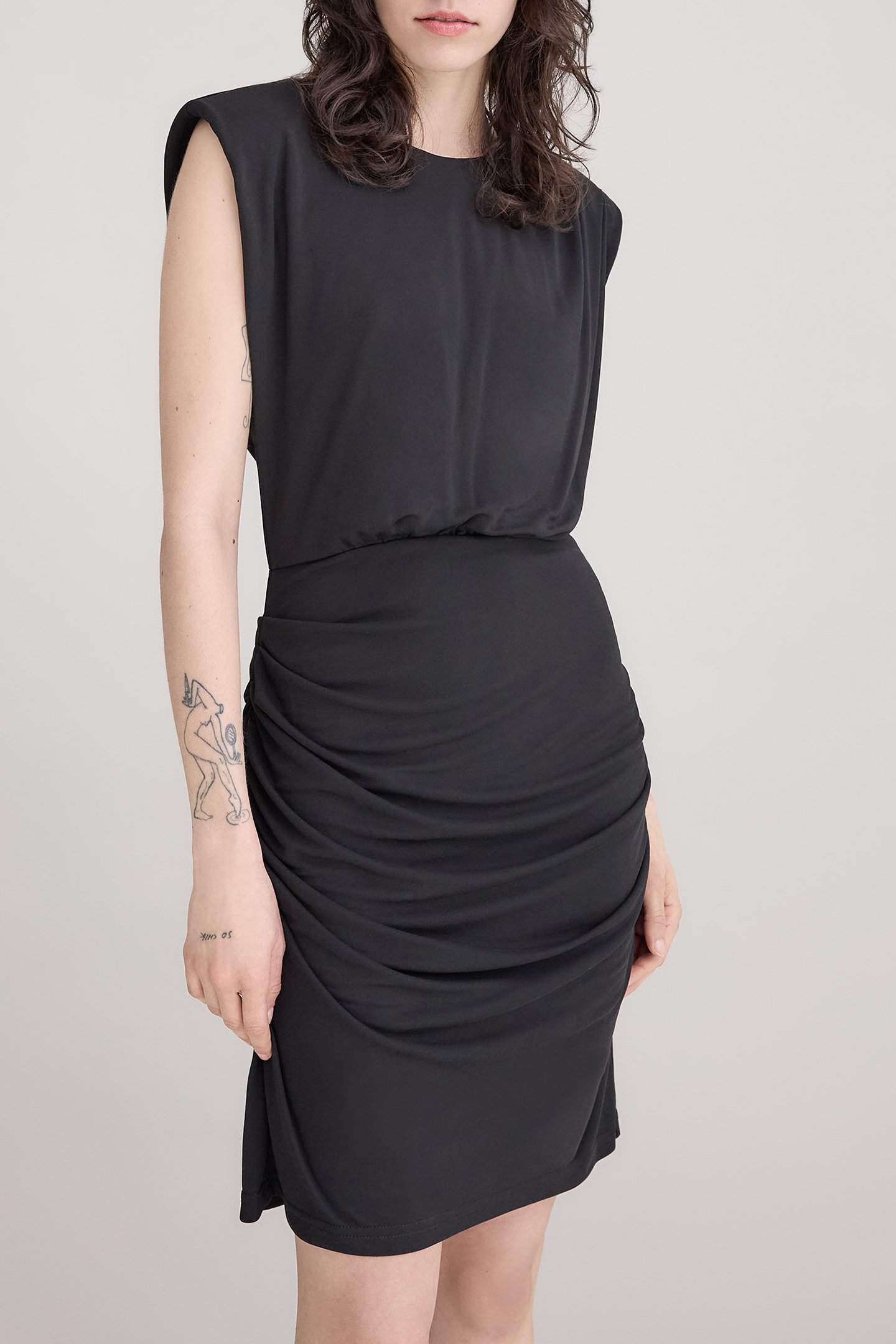BLACK DRAPED DRESS WITH ASYMMETRICAL CUT-OUT 1
